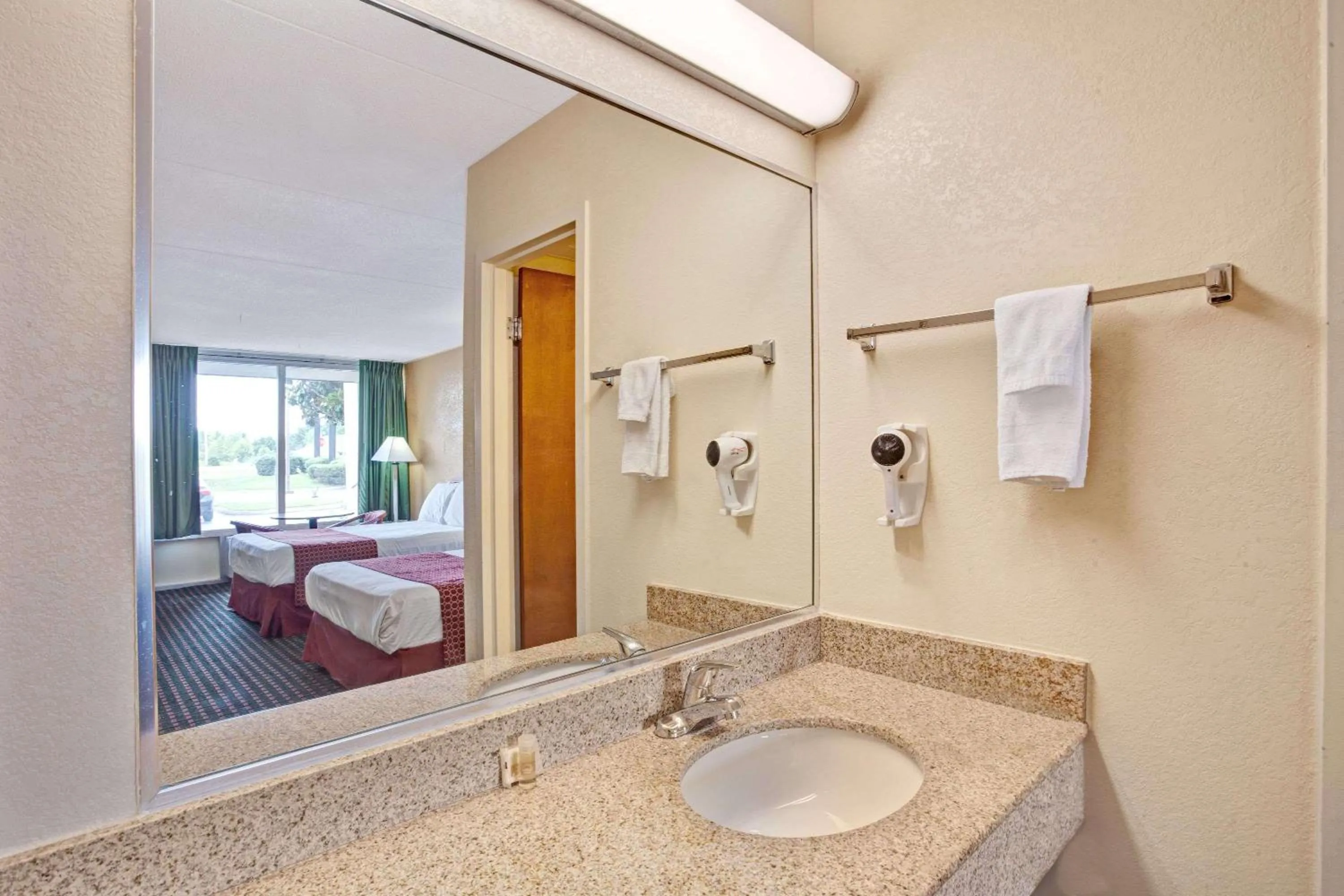 Bathroom, Bed in Days Inn by Wyndham Clarksville TN