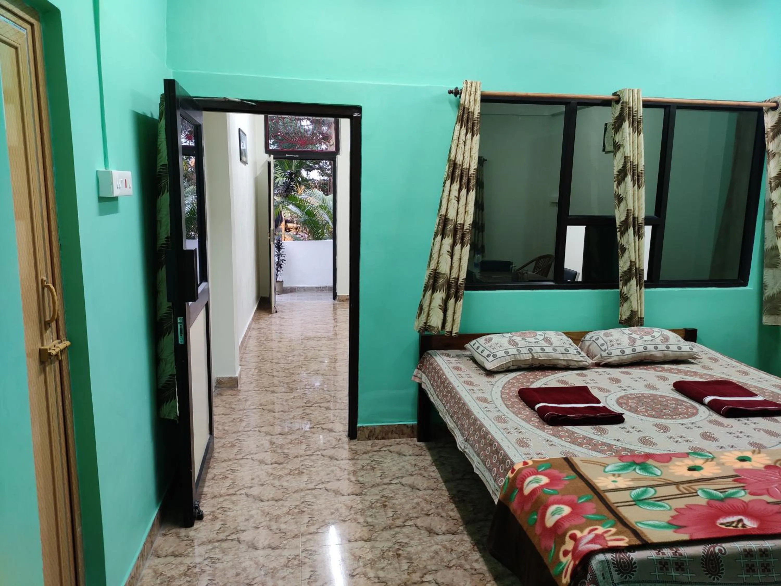 Photo of the whole room, Bed in The Lotus Home