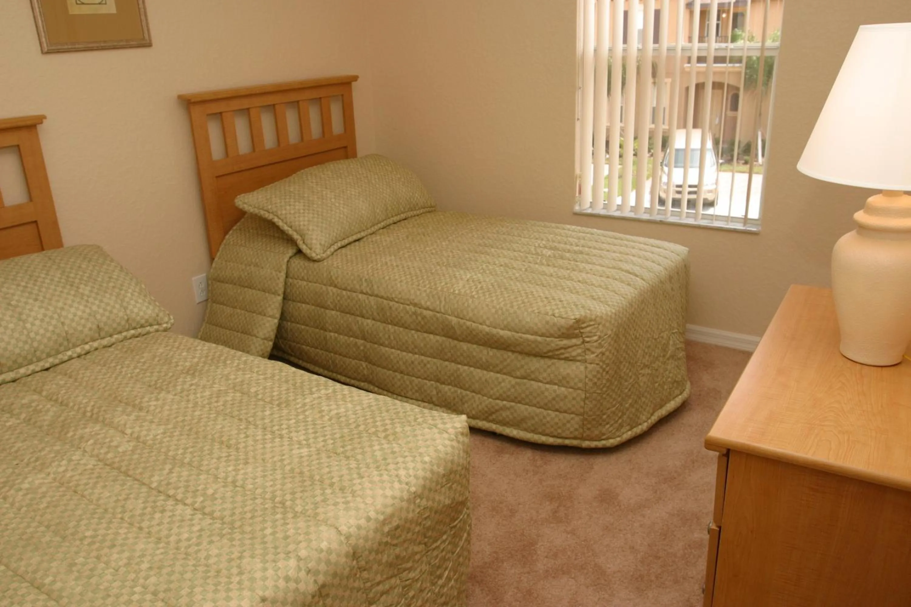 Bed in Regal Palms Resort & Spa