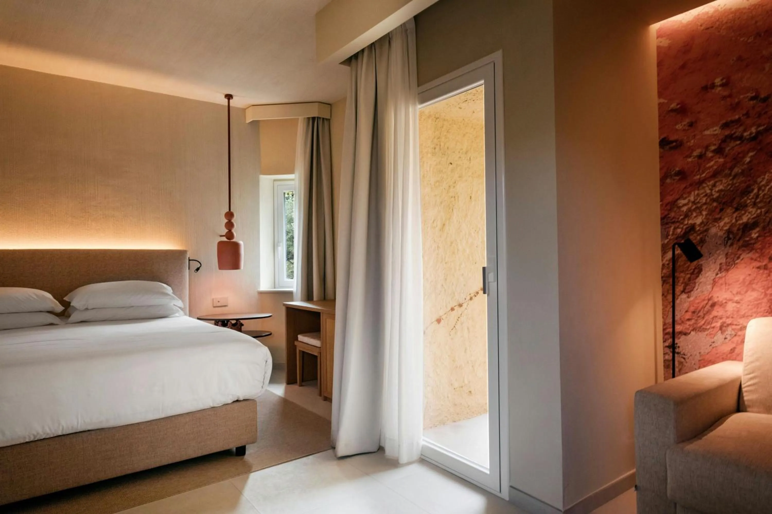 Photo of the whole room, Bed in Mangia's Brucoli, Sicily, Autograph Collection