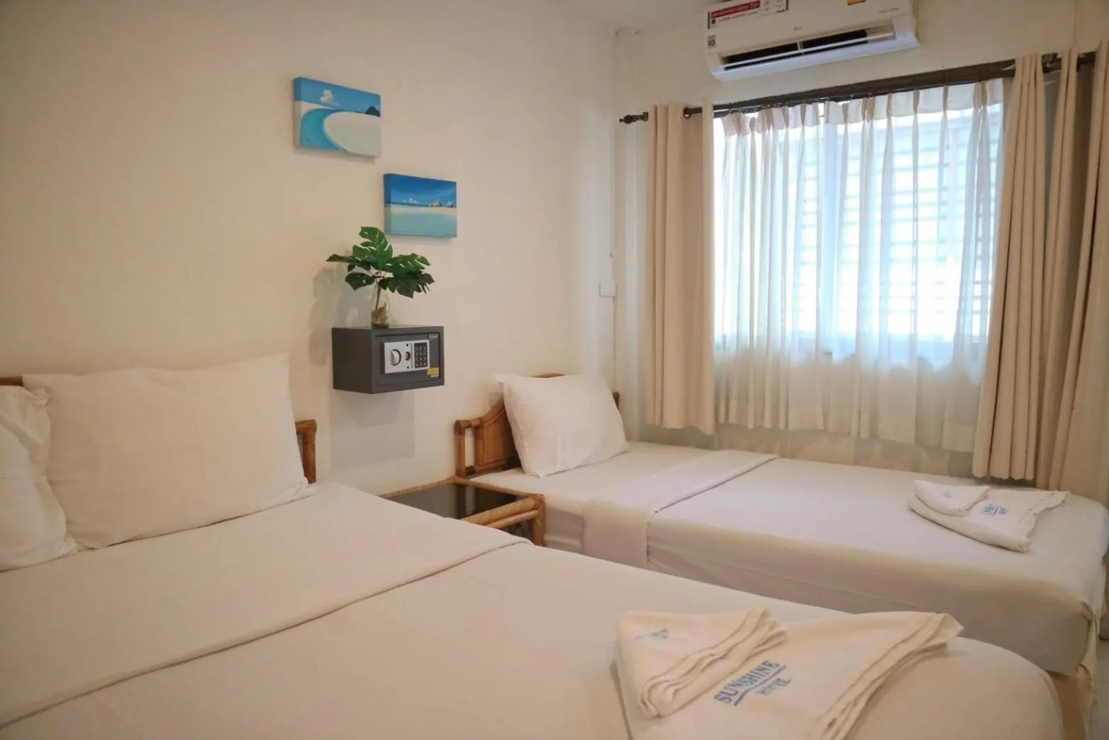 Bed in Sunshine Guest House