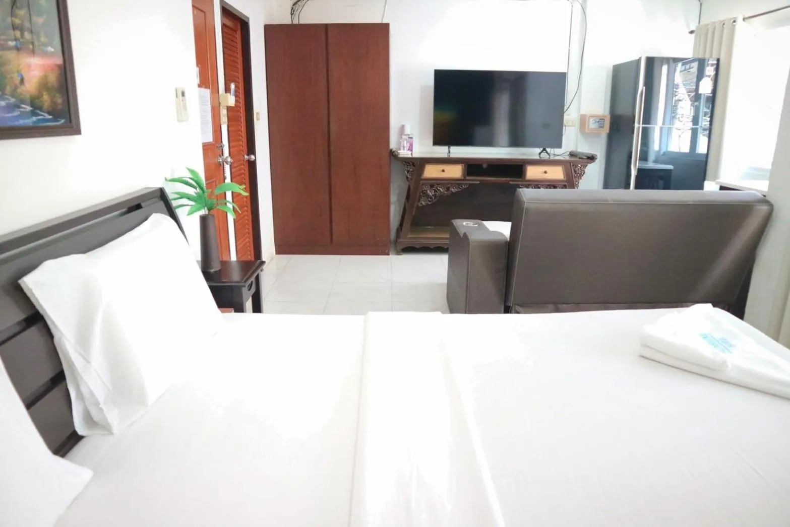 Bed in Sunshine Guest House