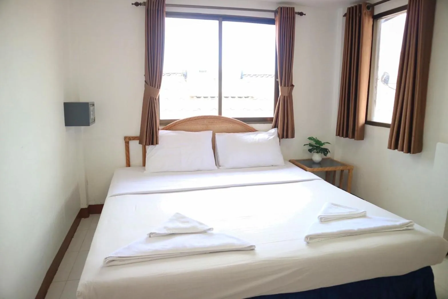 Bed in Sunshine Guest House