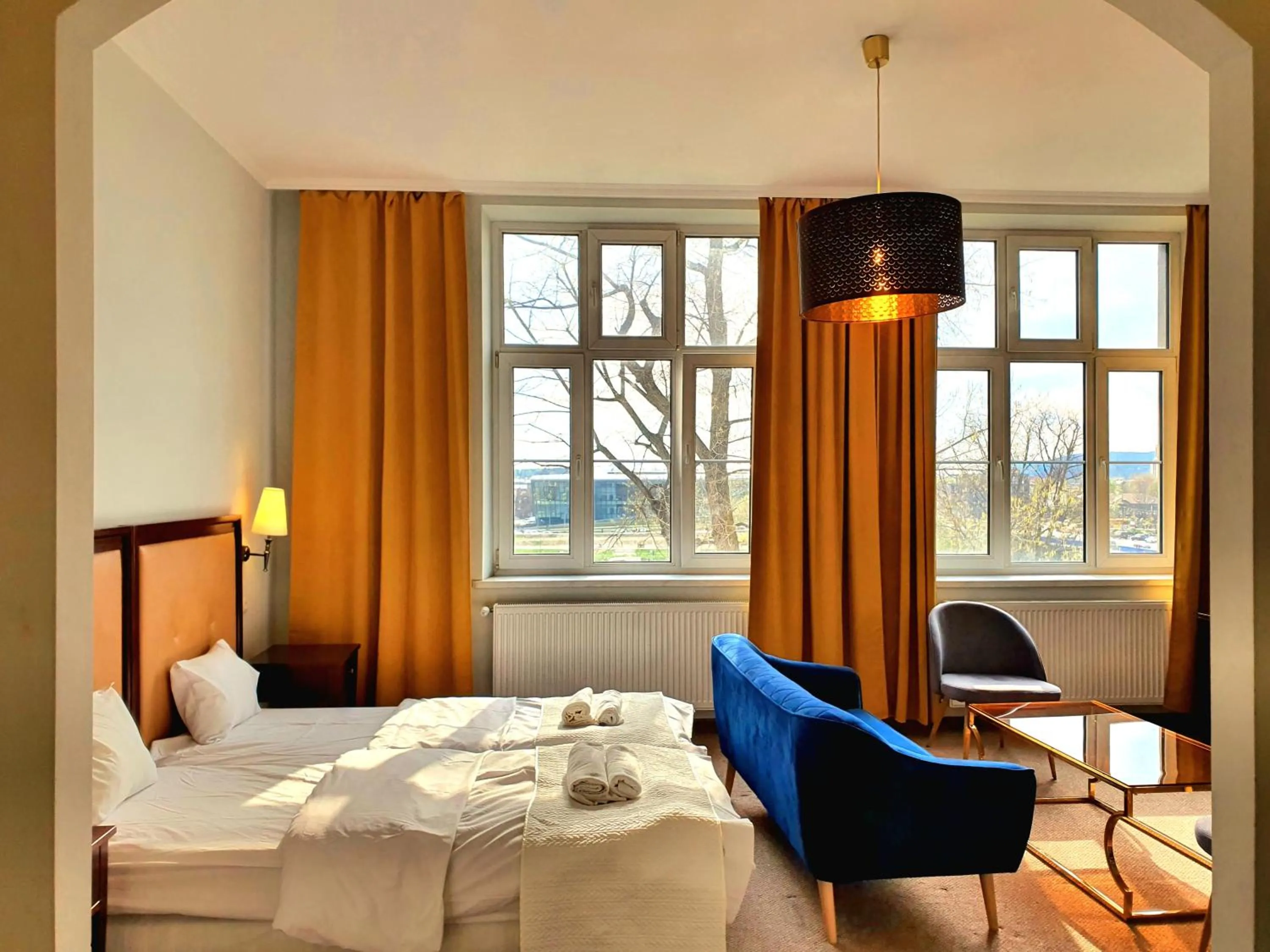 Bed in Holiday Suites Cracow