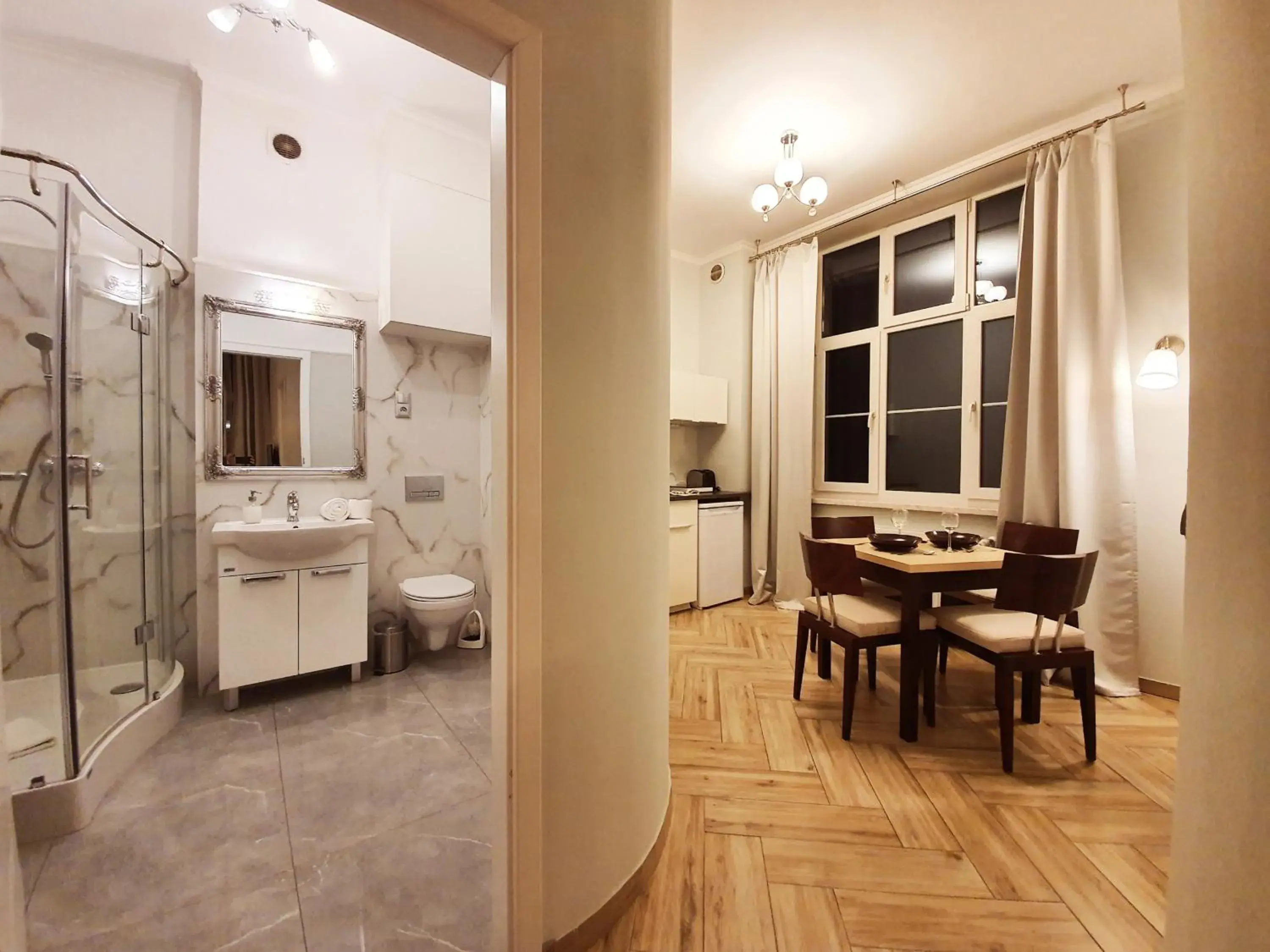 Toilet, Dining Area in Holiday Suites Cracow