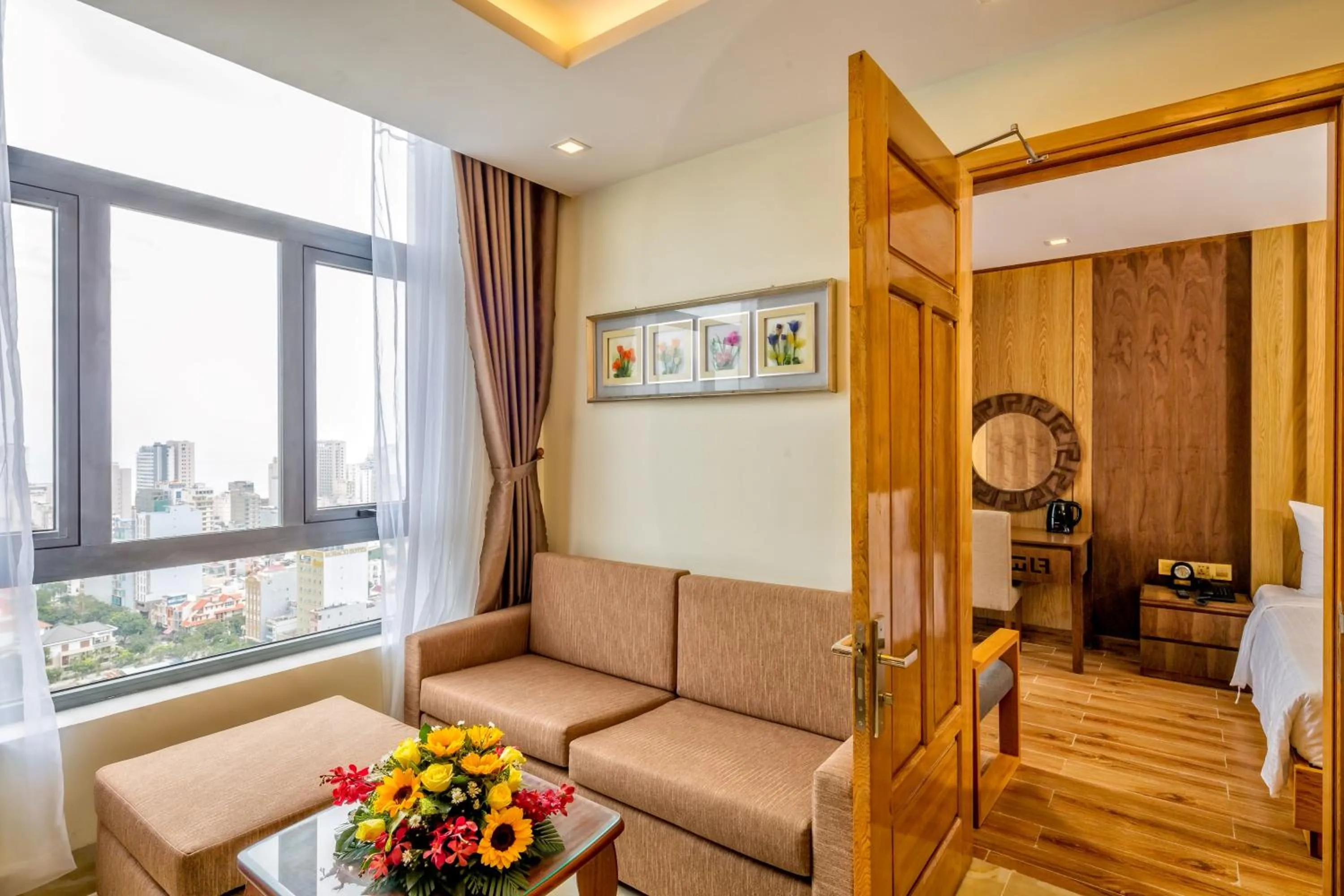 Living room in Nhu Minh Plaza Danang Hotel