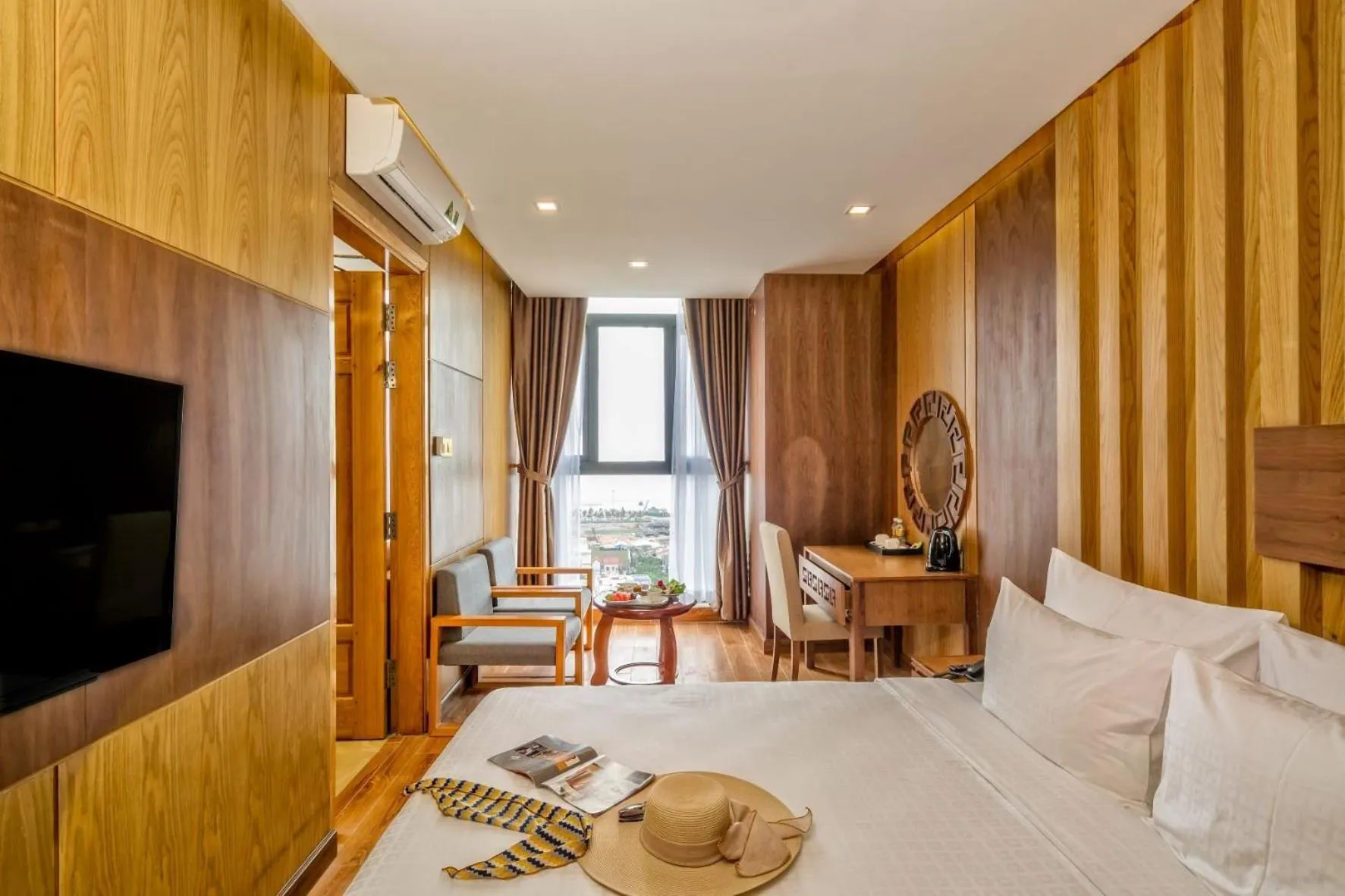 Communal lounge/ TV room, Bed in Nhu Minh Plaza Danang Hotel