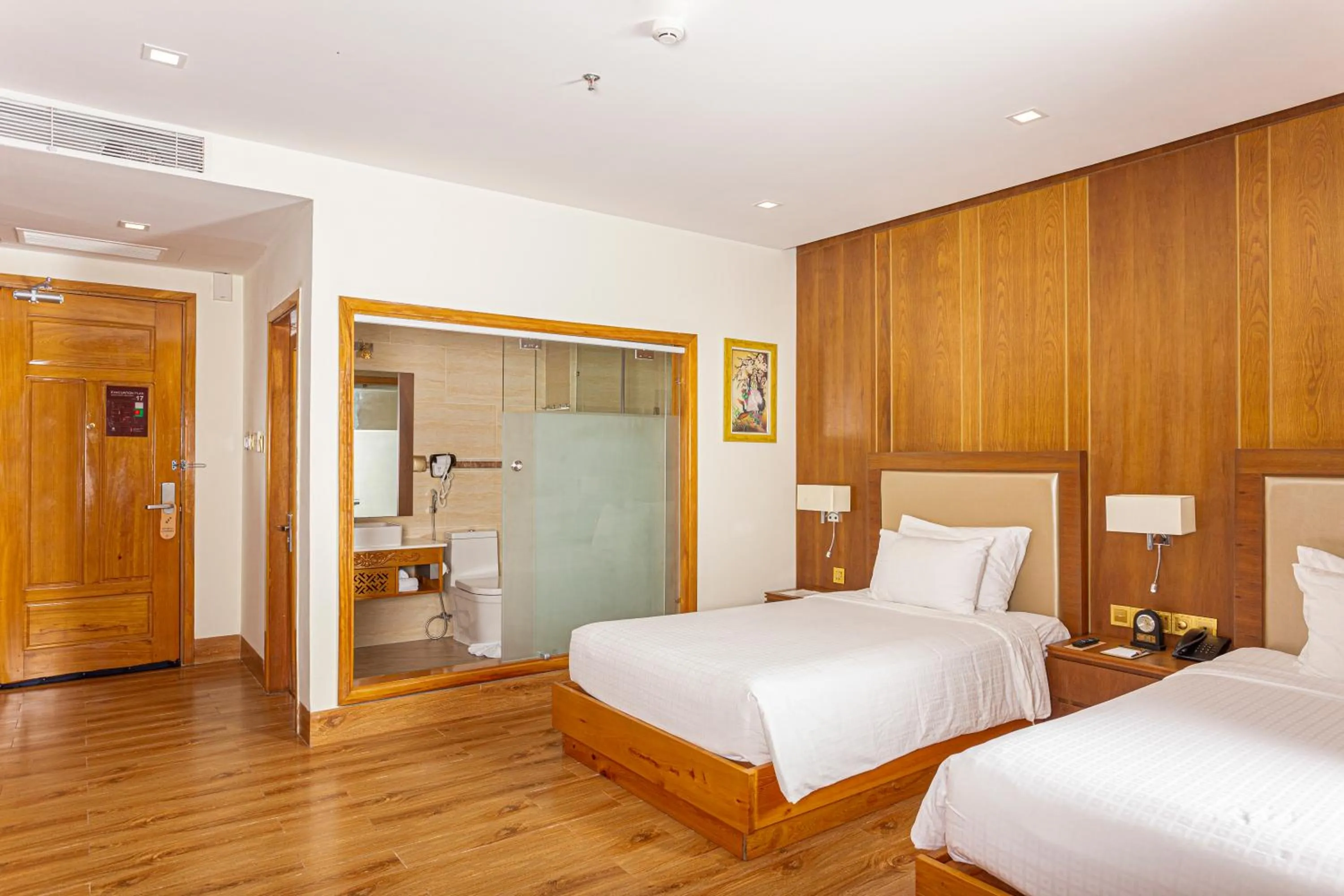 Bed in Nhu Minh Plaza Danang Hotel