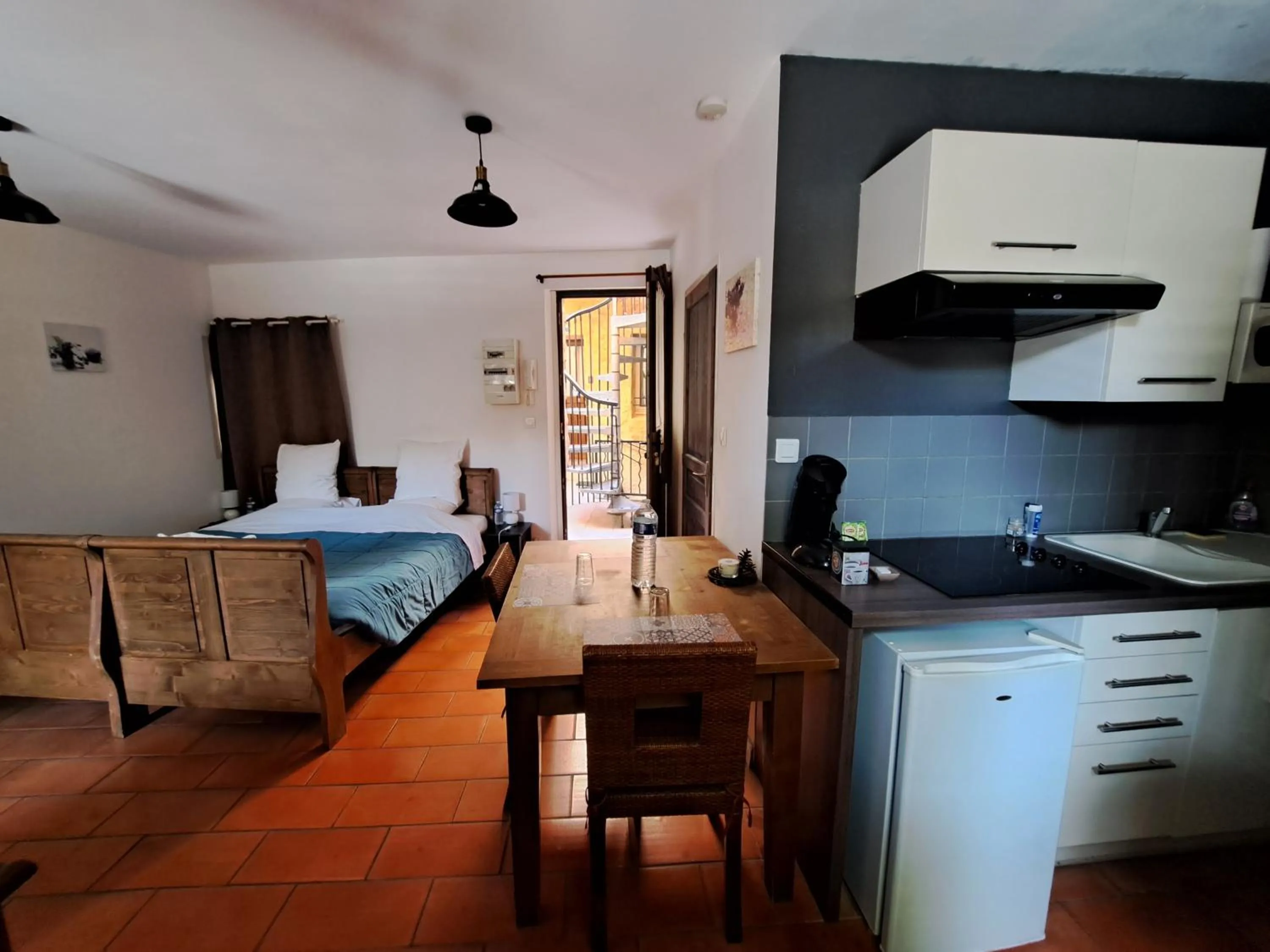 Kitchen or kitchenette in Appart-Hôtel Résidence Maloc