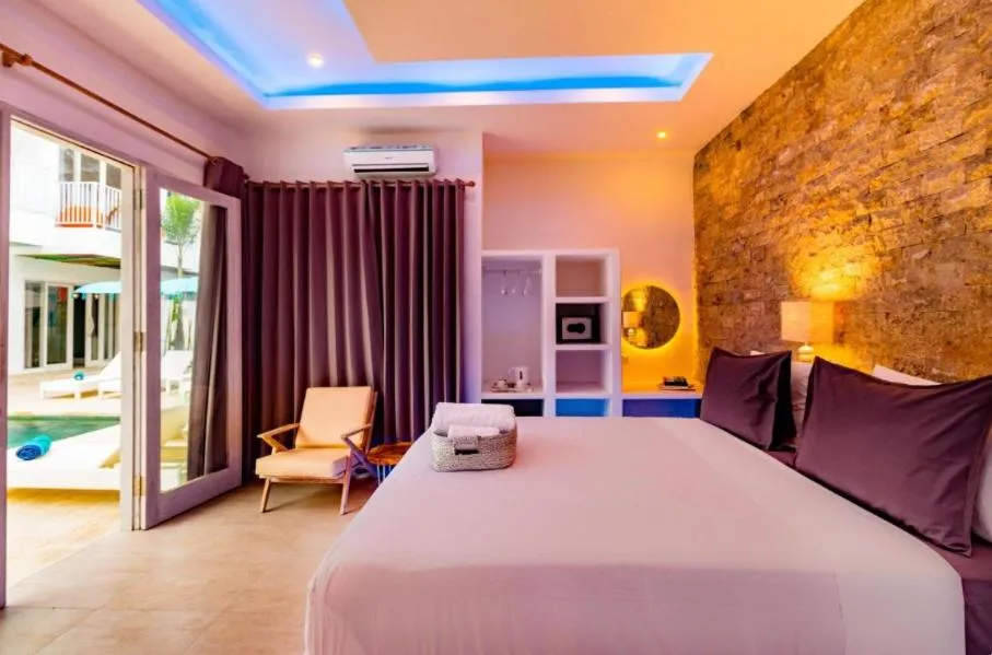 Bed in Cocotoa Boutique Hotel & Villa