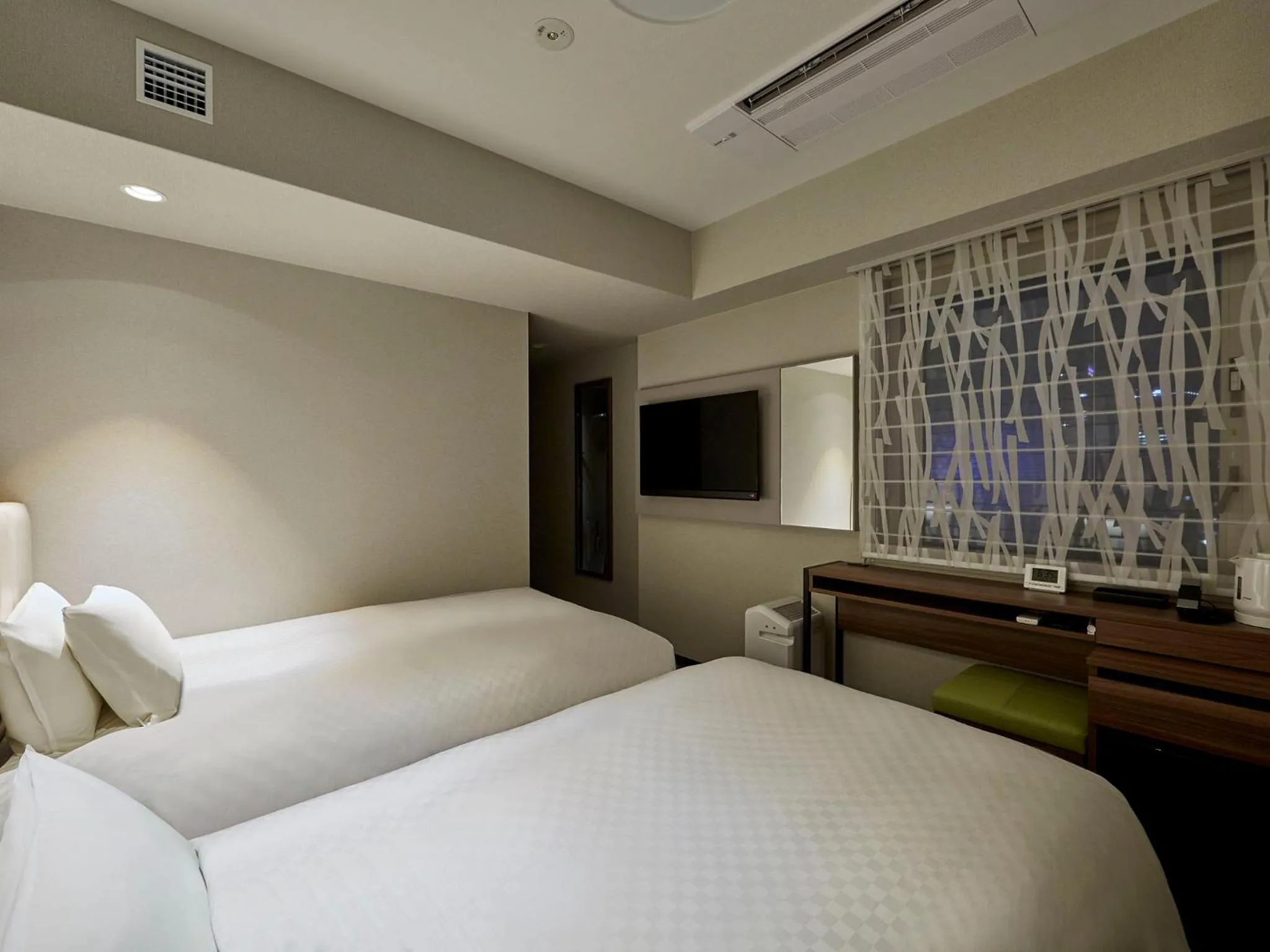 Photo of the whole room, Bed in Hearton Hotel Shinsaibashi Nagahoridouri