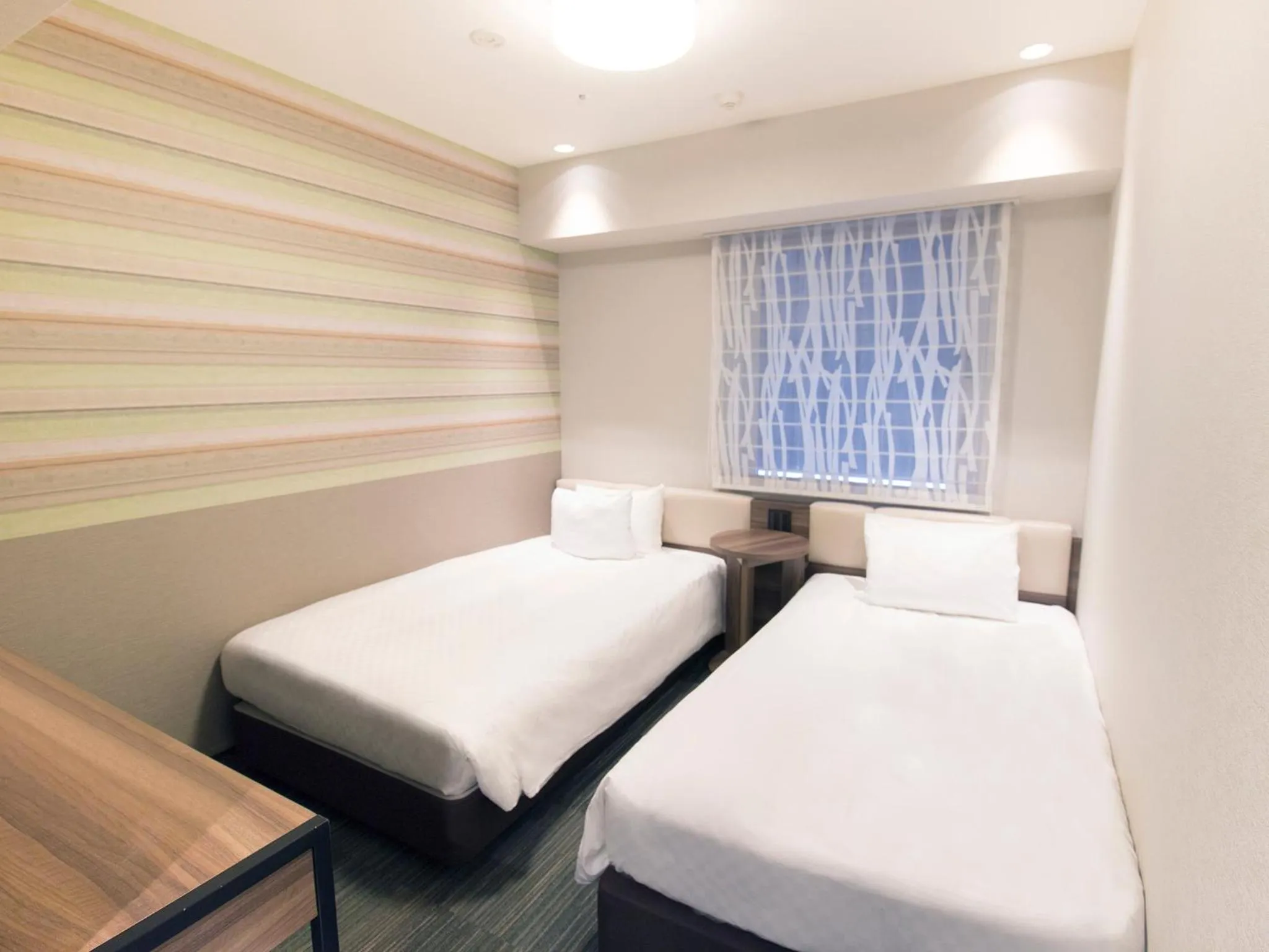 Photo of the whole room, Bed in Hearton Hotel Shinsaibashi Nagahoridouri