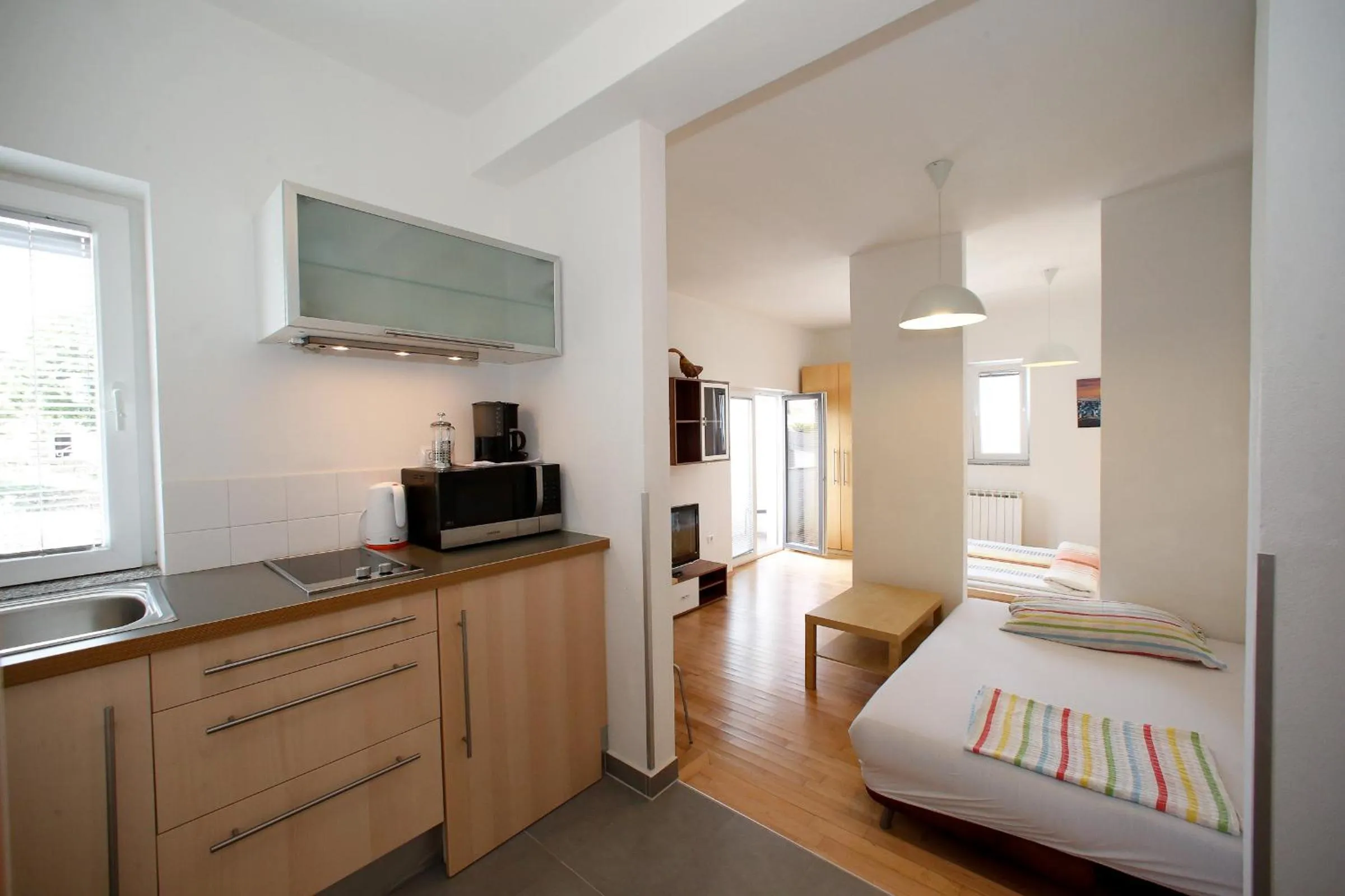 Bed in BC Better Choice Apartments with Central Heating