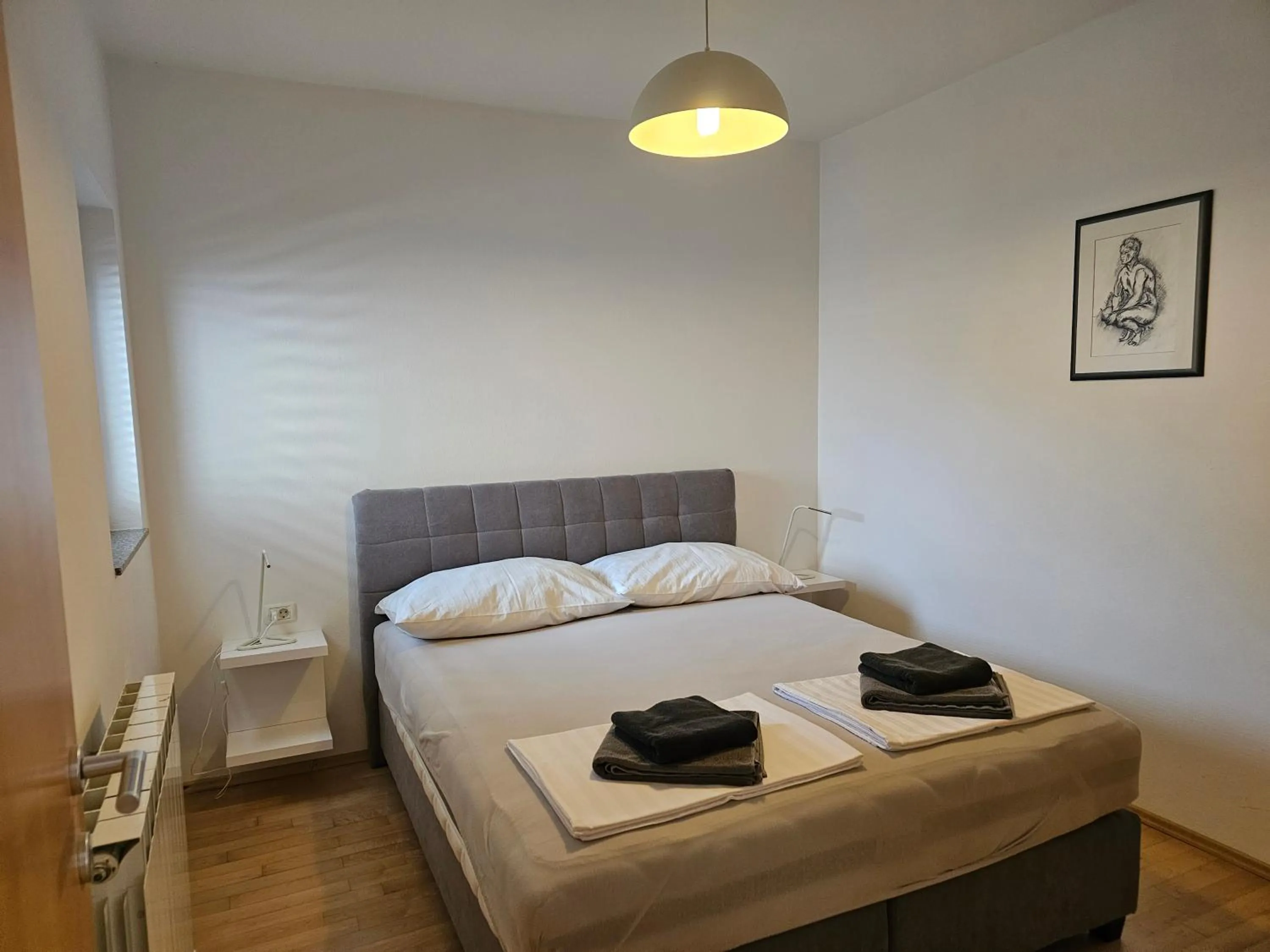 Bed in BC Better Choice Apartments with Central Heating