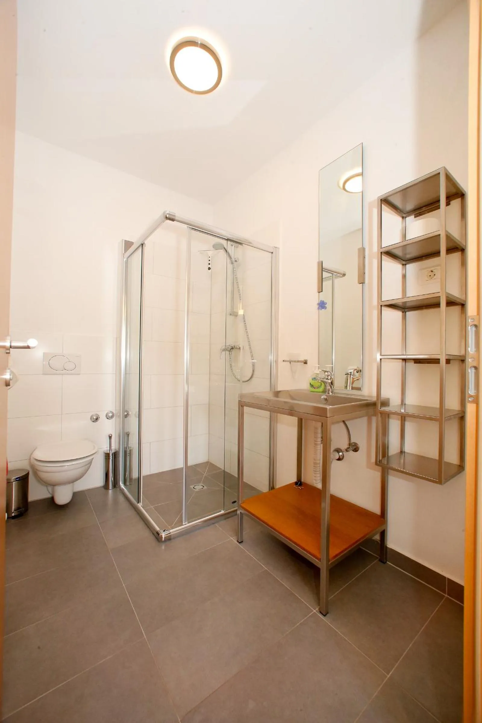 Bathroom in BC Better Choice Apartments with Central Heating