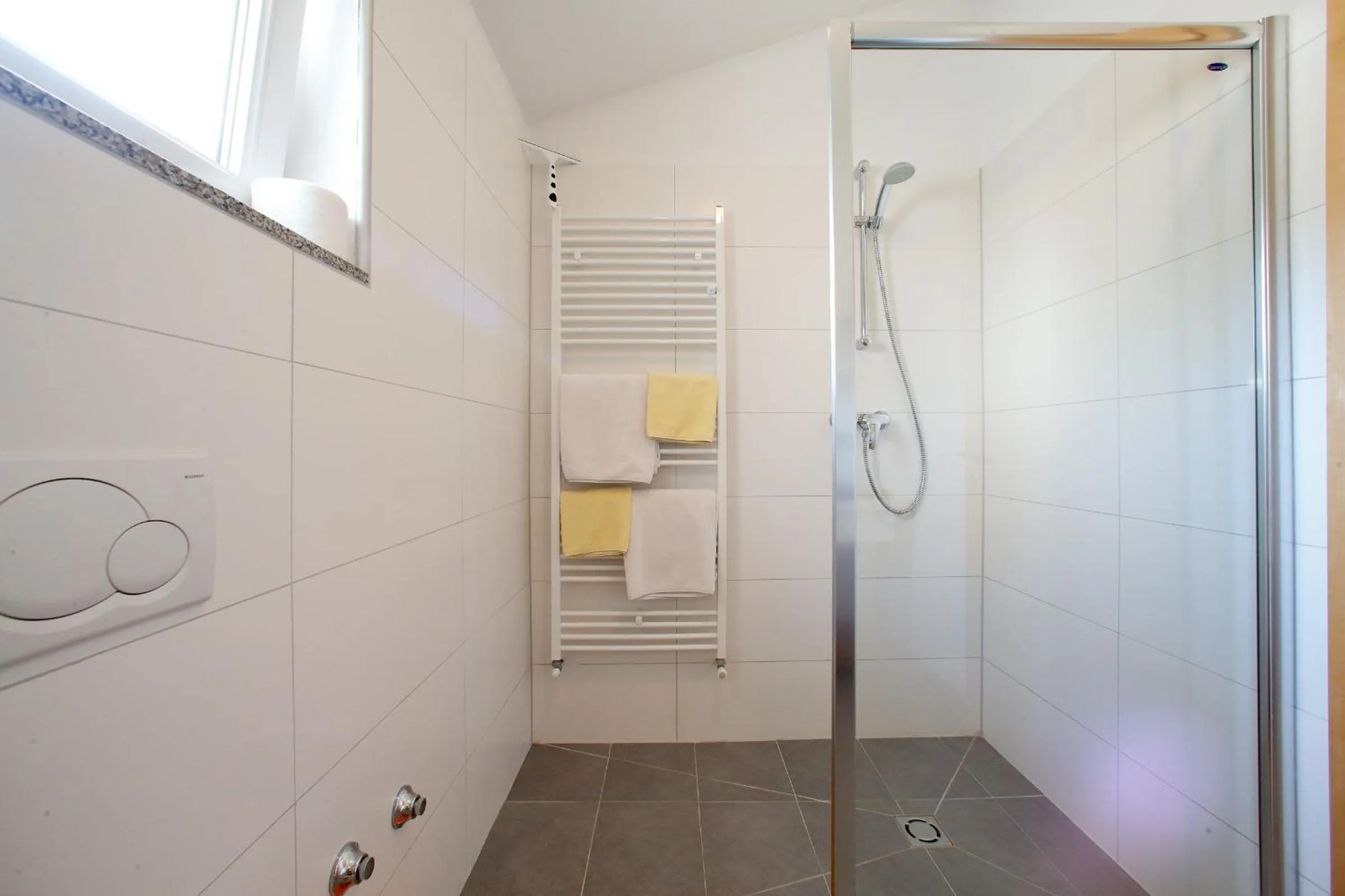Bathroom in BC Better Choice Apartments with Central Heating