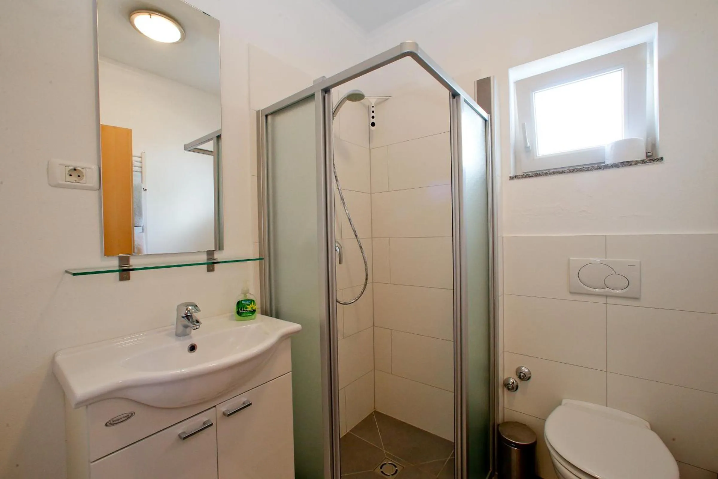 Bathroom in BC Better Choice Apartments with Central Heating