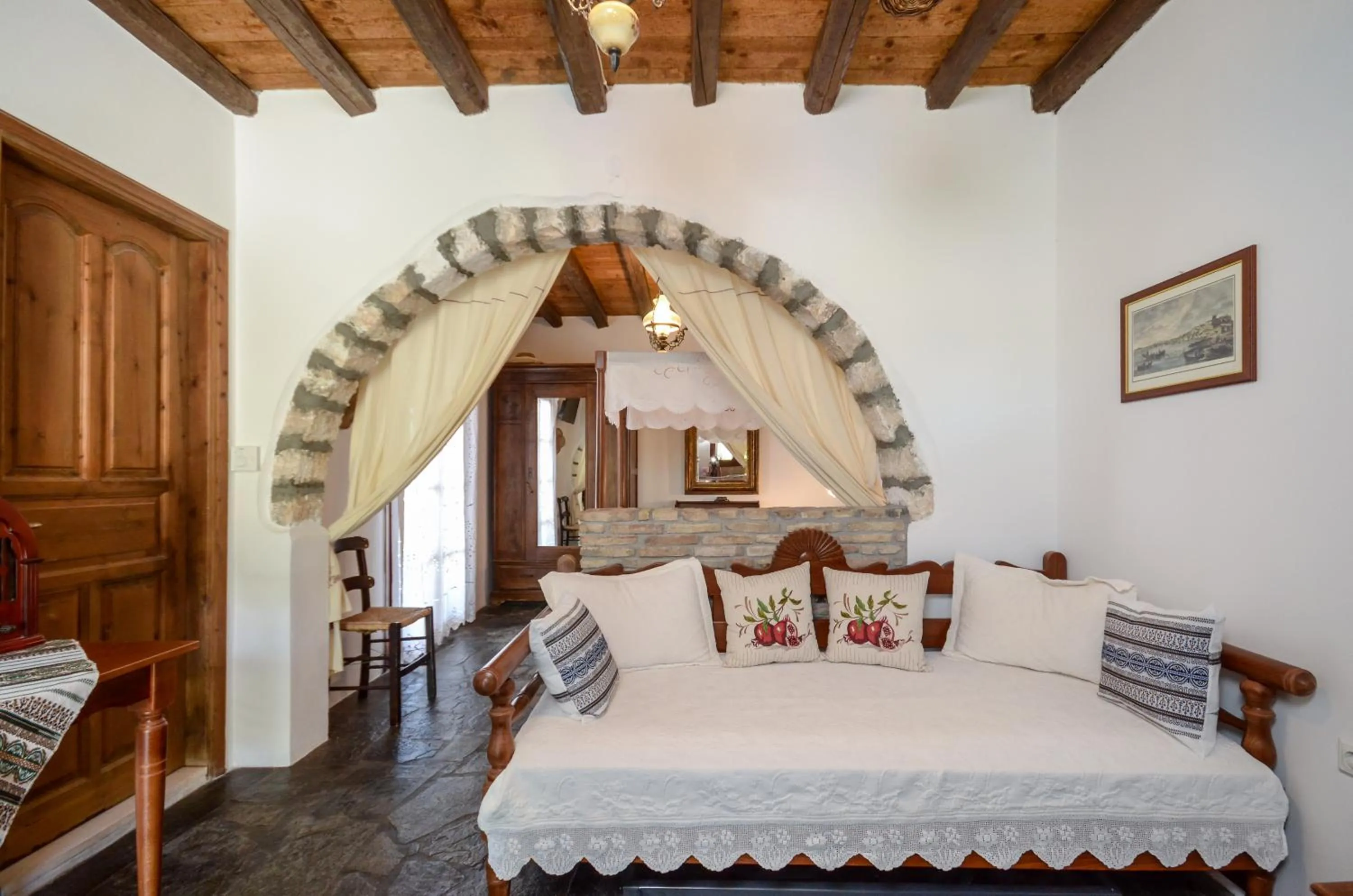 Seating area, Bed in Naxos Filoxenia Hotel