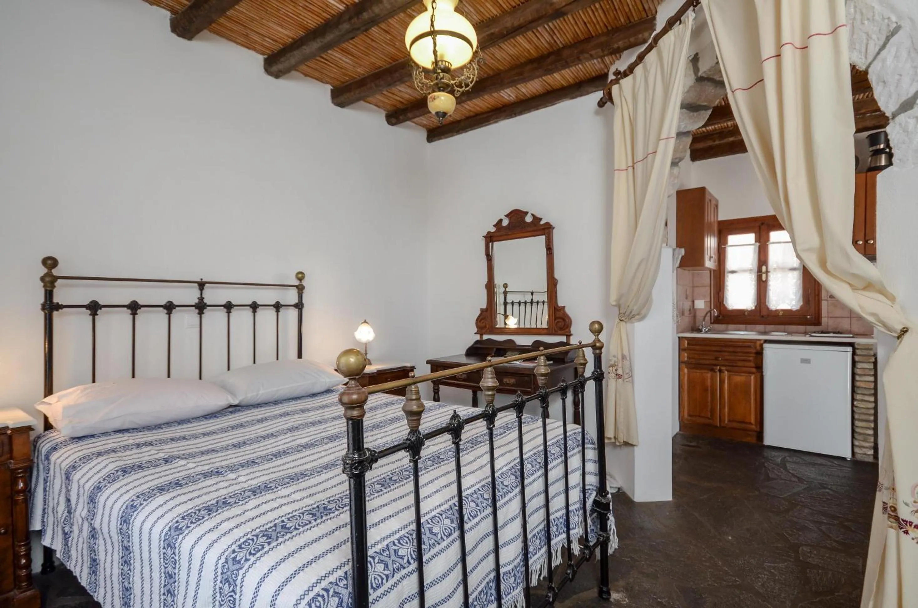Bed in Naxos Filoxenia Hotel