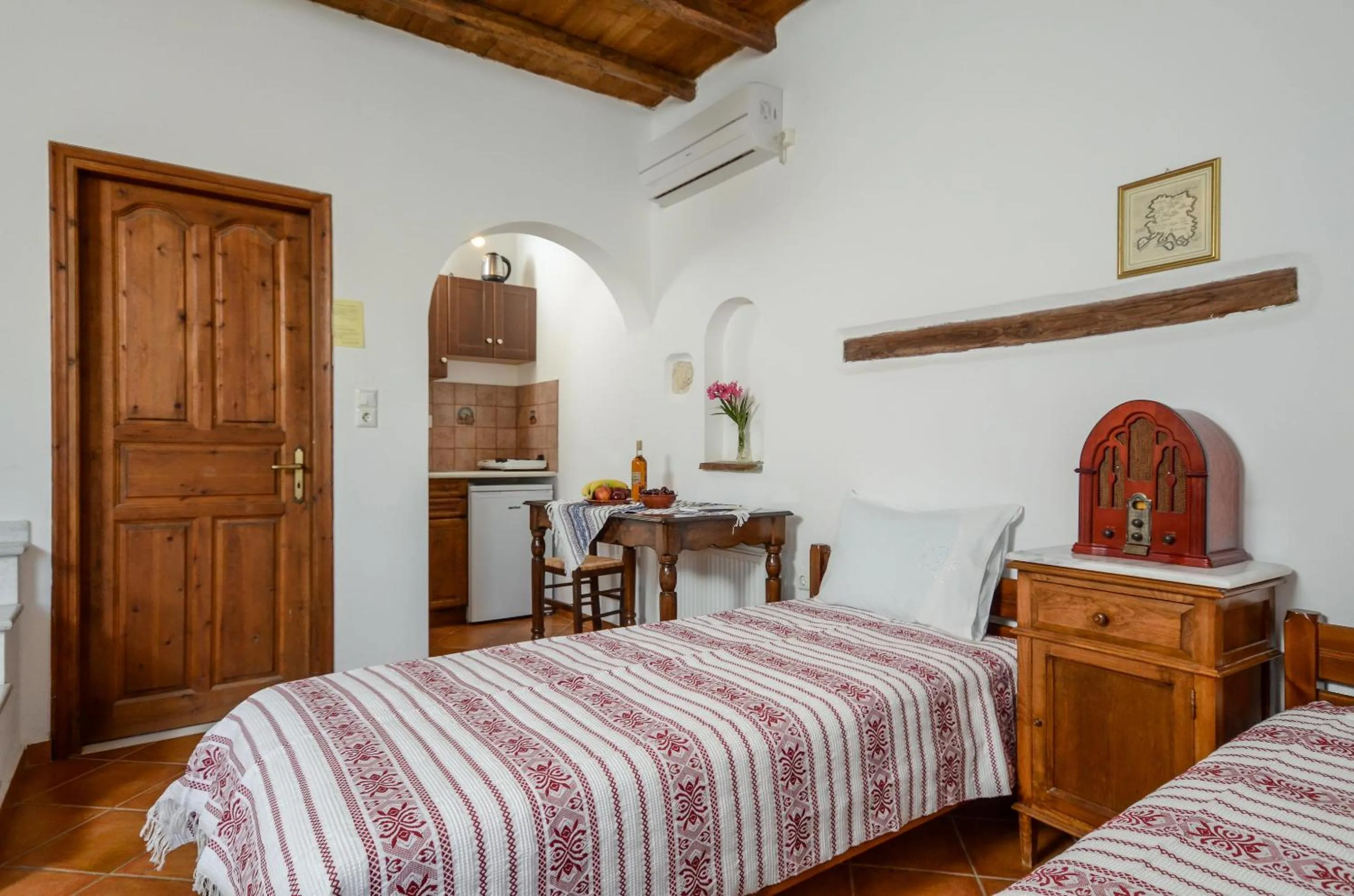 Bed in Naxos Filoxenia Hotel