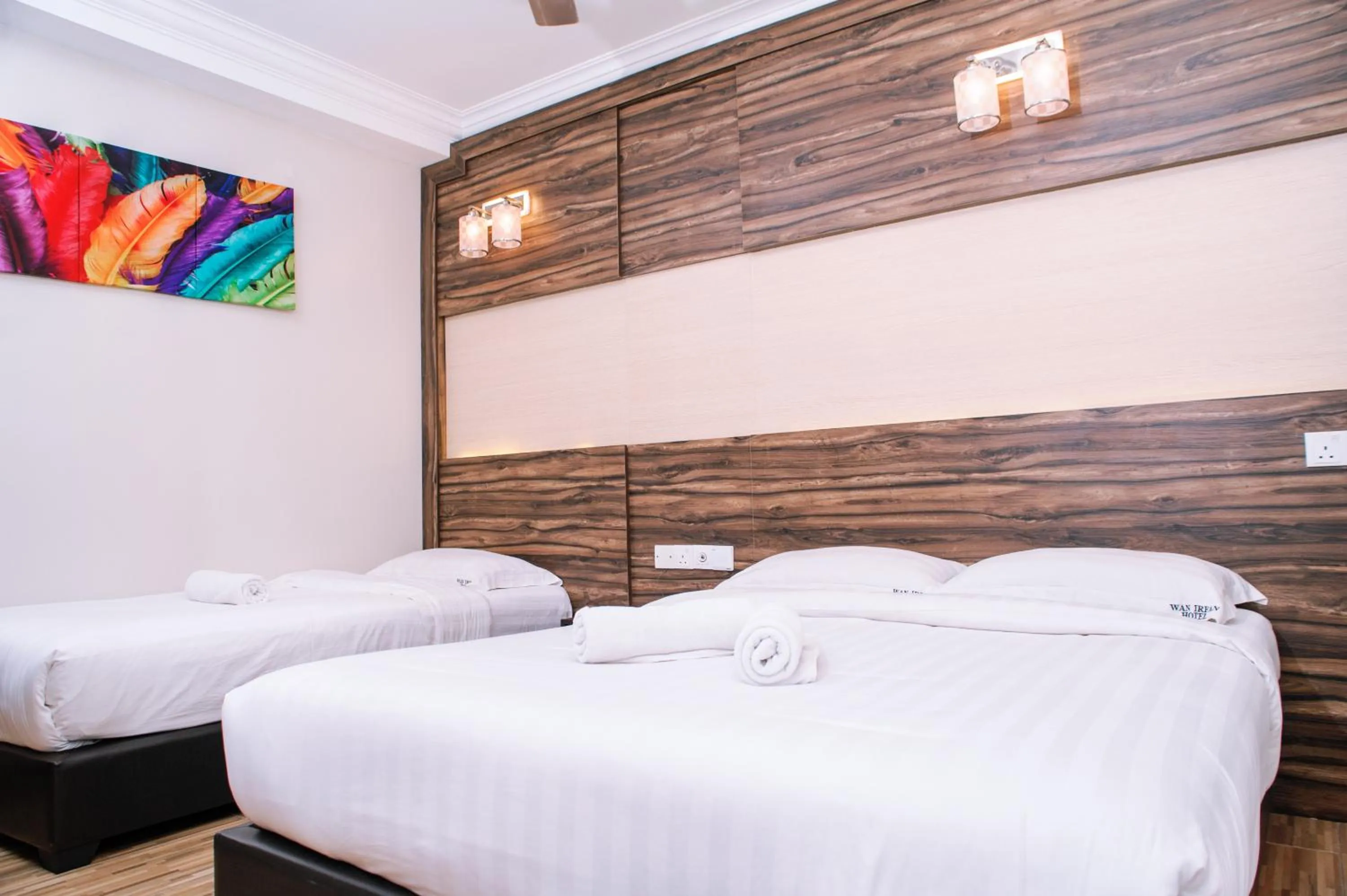 Bed in Wan Alyasa Hotel