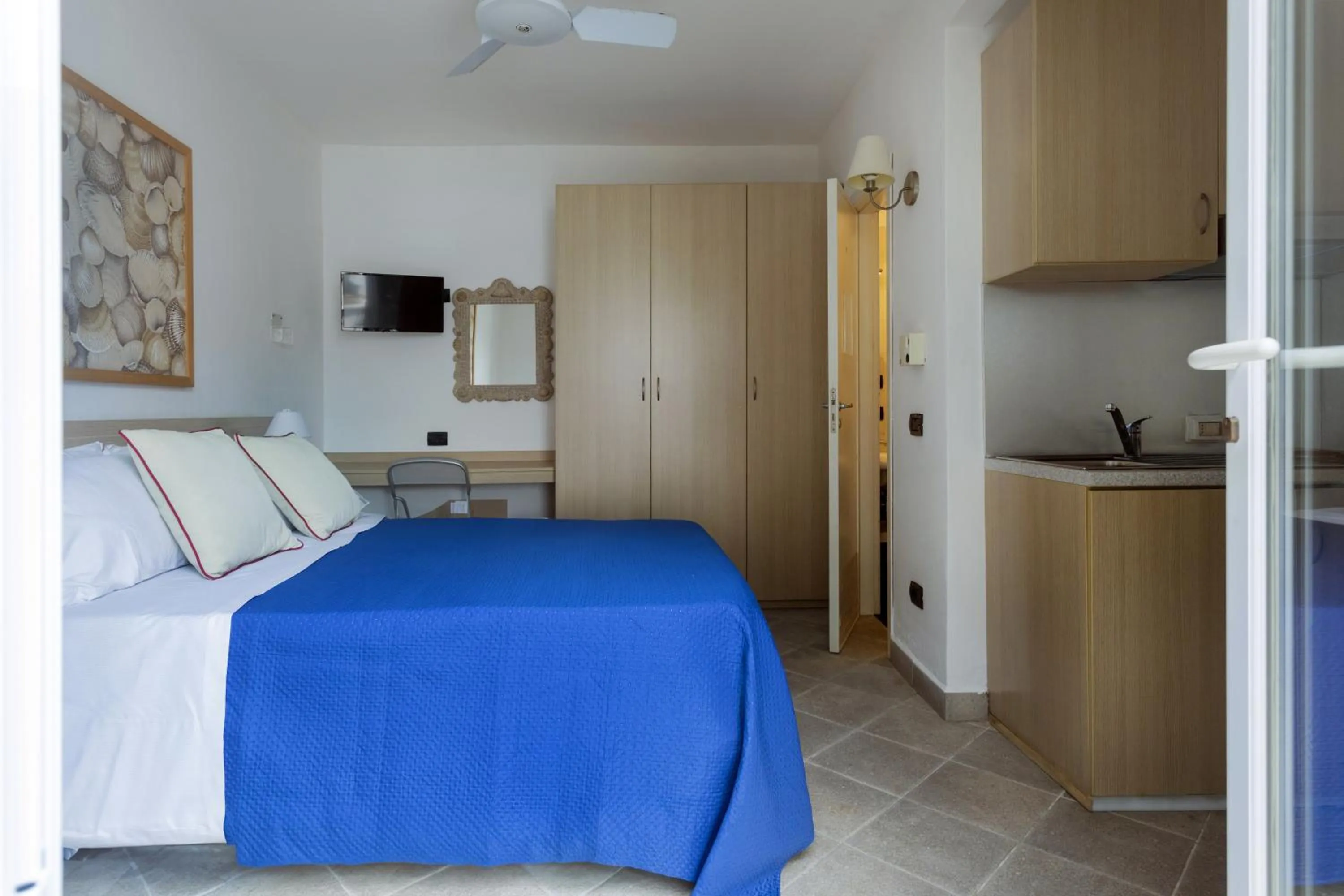 Photo of the whole room, Bed in Residence Stella Marina