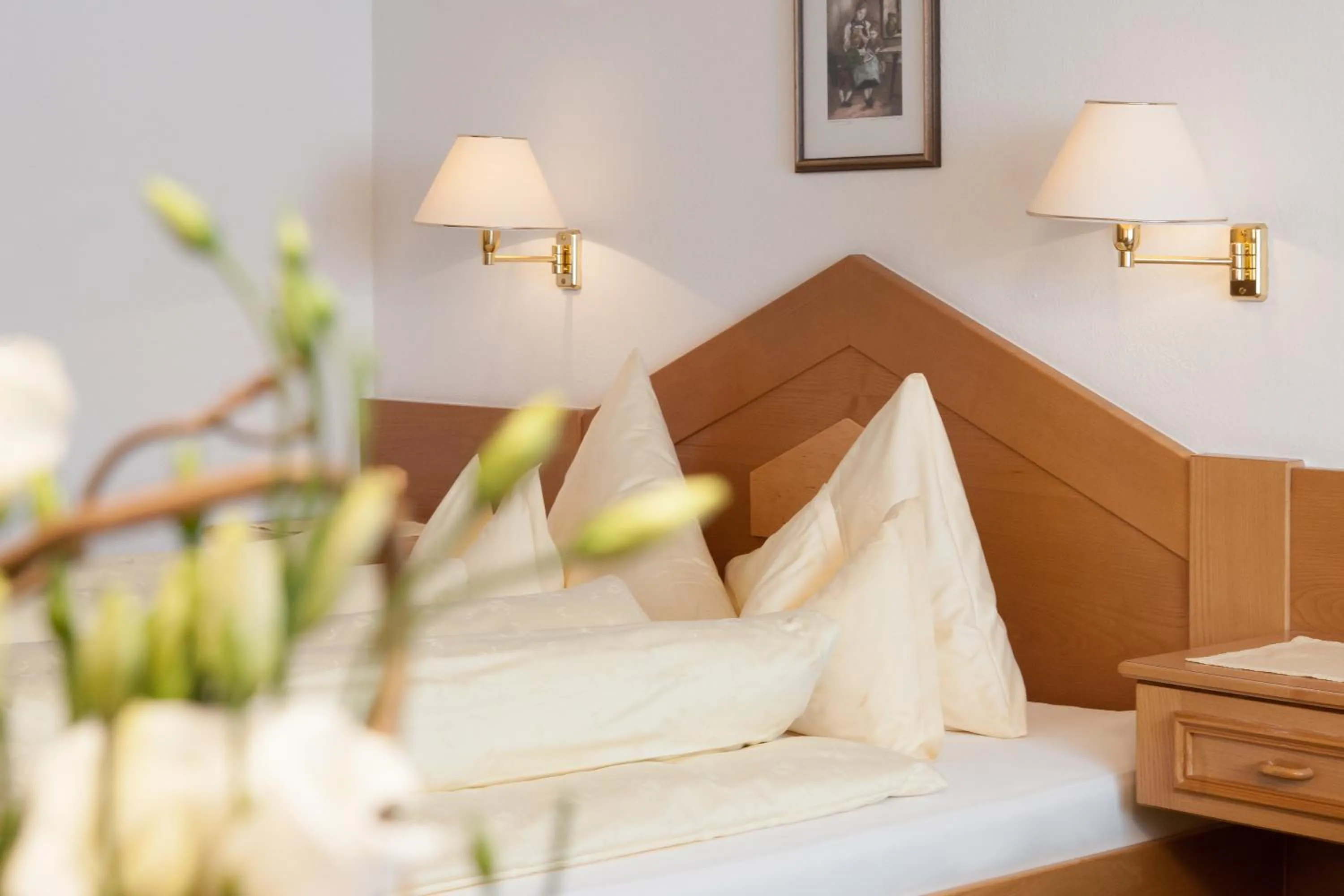 Bed in Hotel Jagdhof Bed & Breakfast