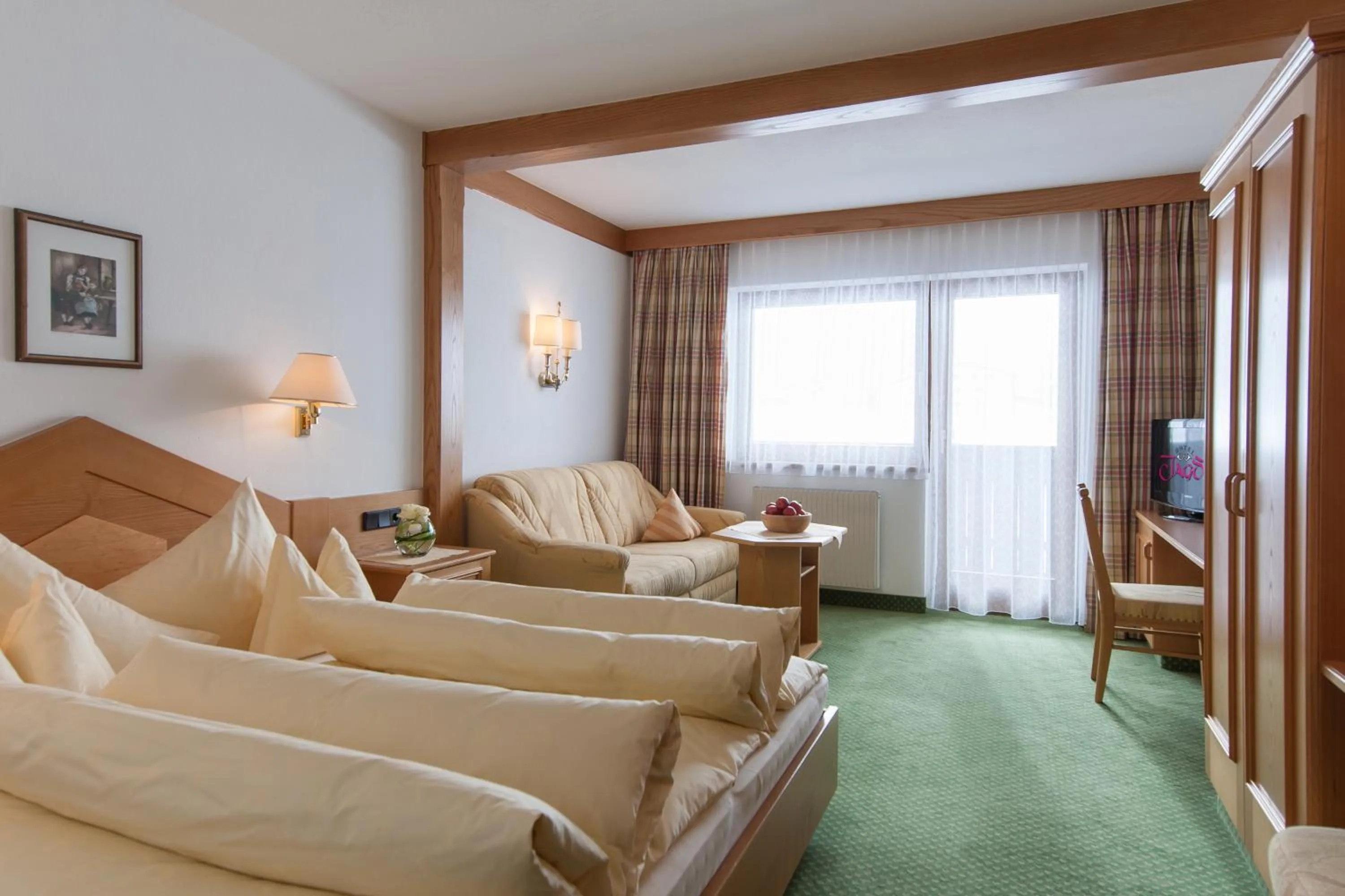 Bed in Hotel Jagdhof Bed & Breakfast