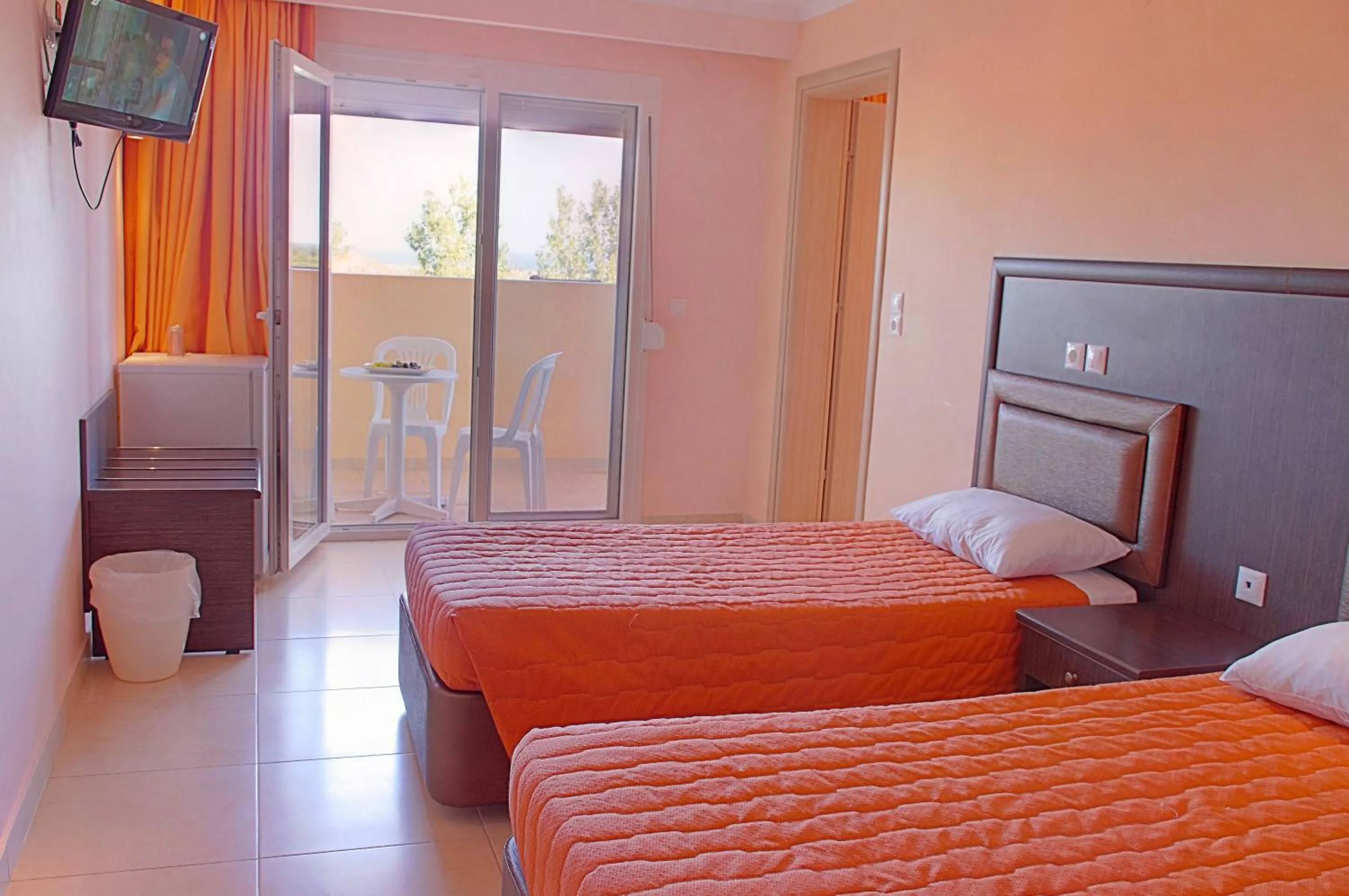 Bed in Grand Platon Hotel