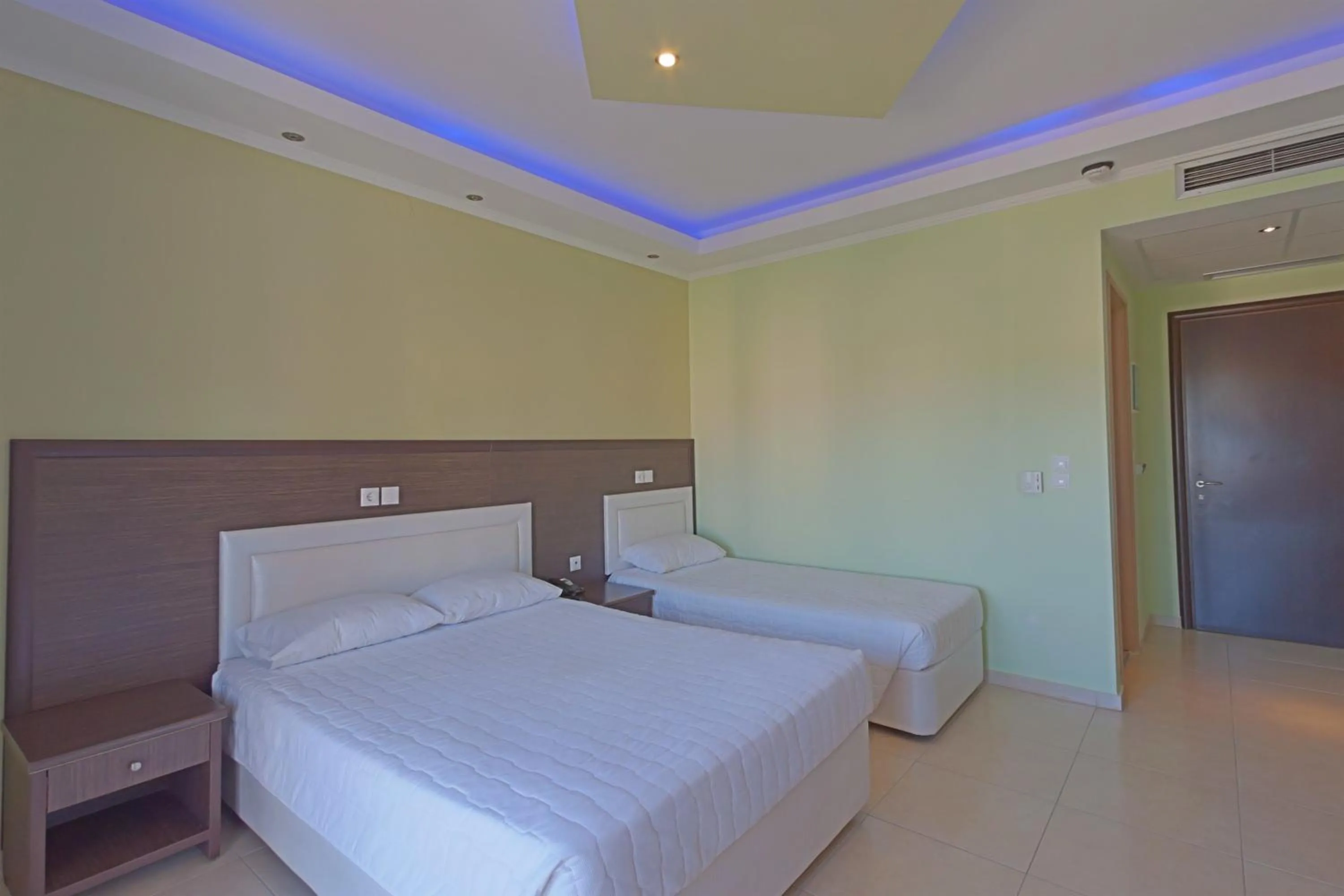 Bed in Grand Platon Hotel