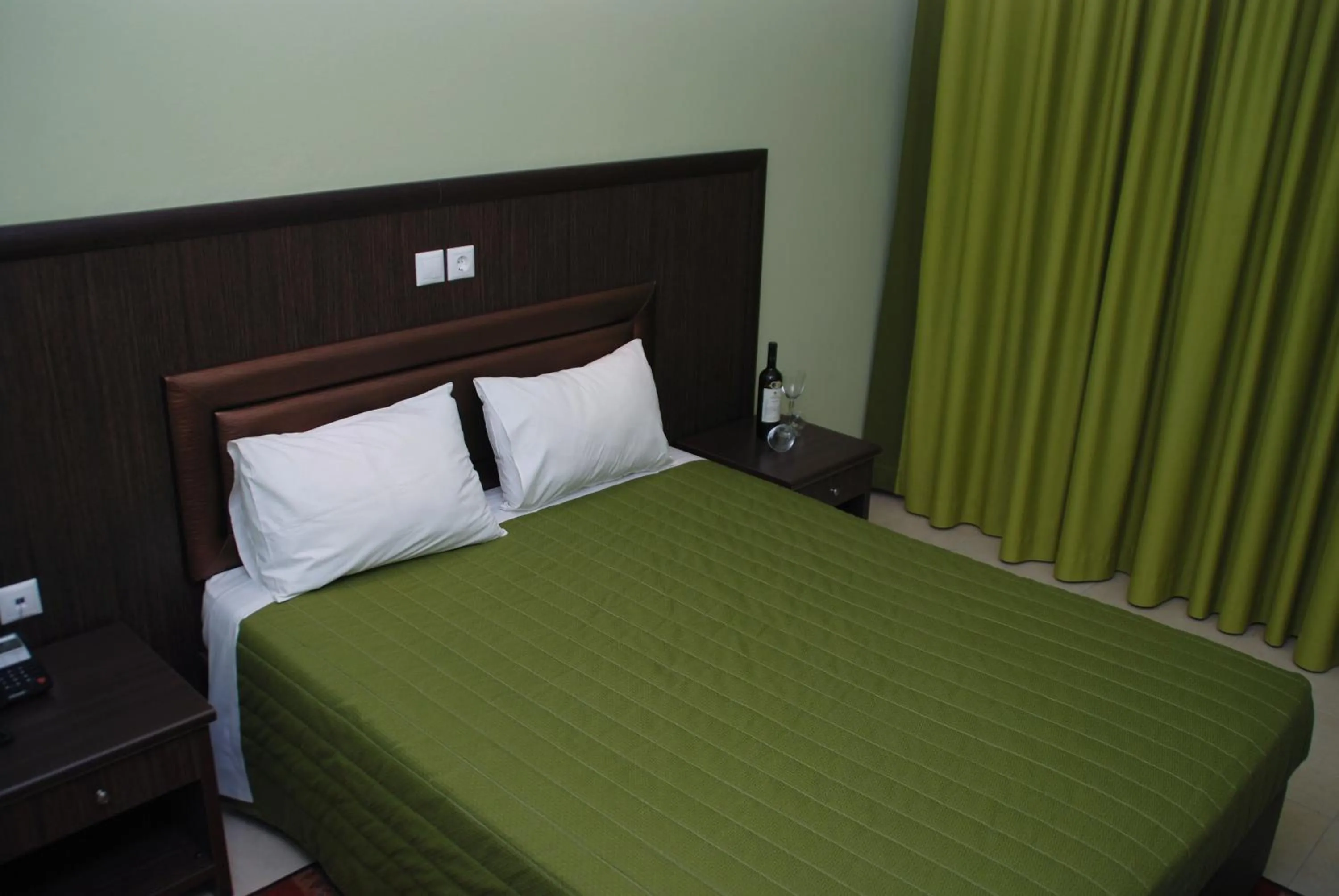 Bed in Grand Platon Hotel
