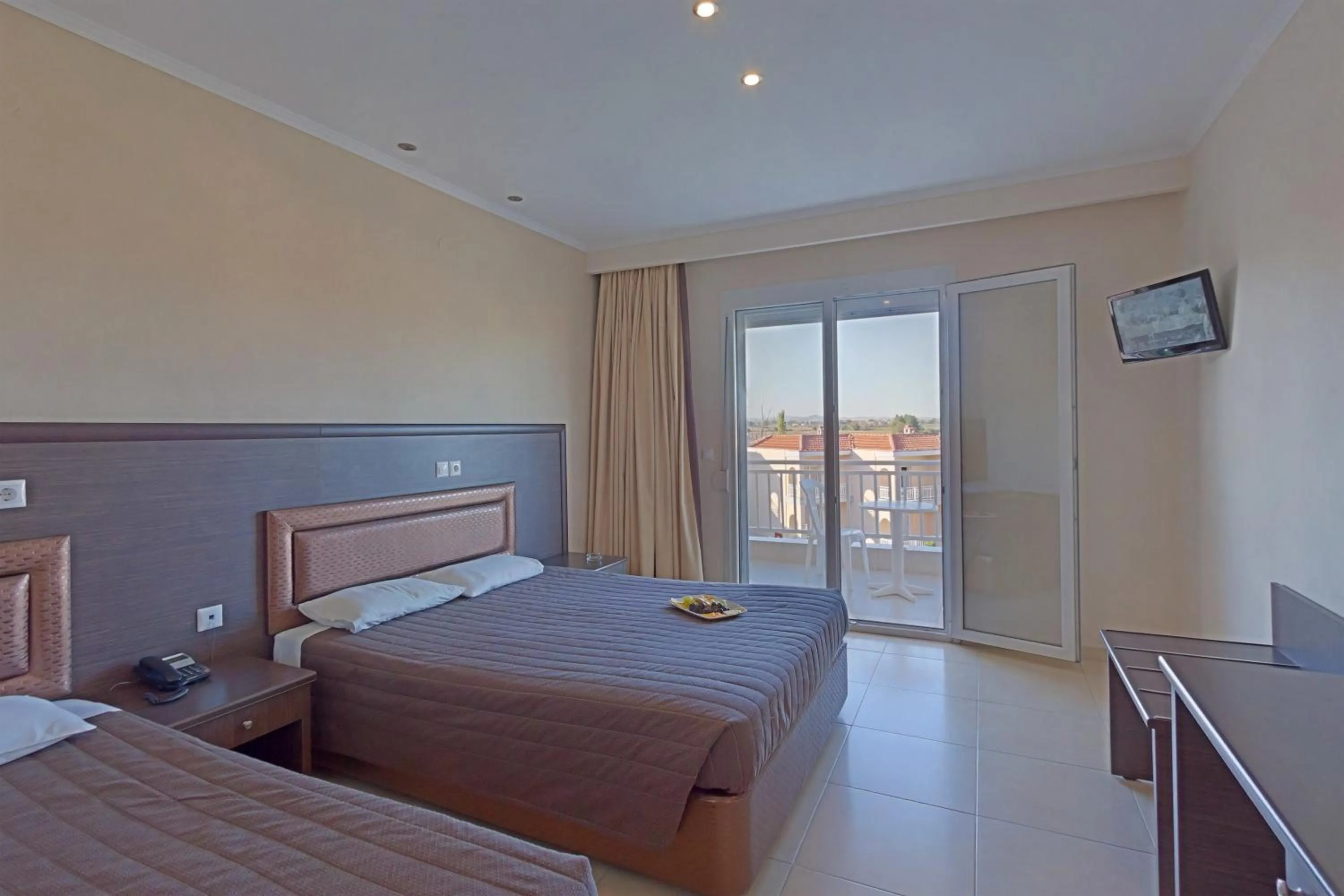 Bed in Grand Platon Hotel