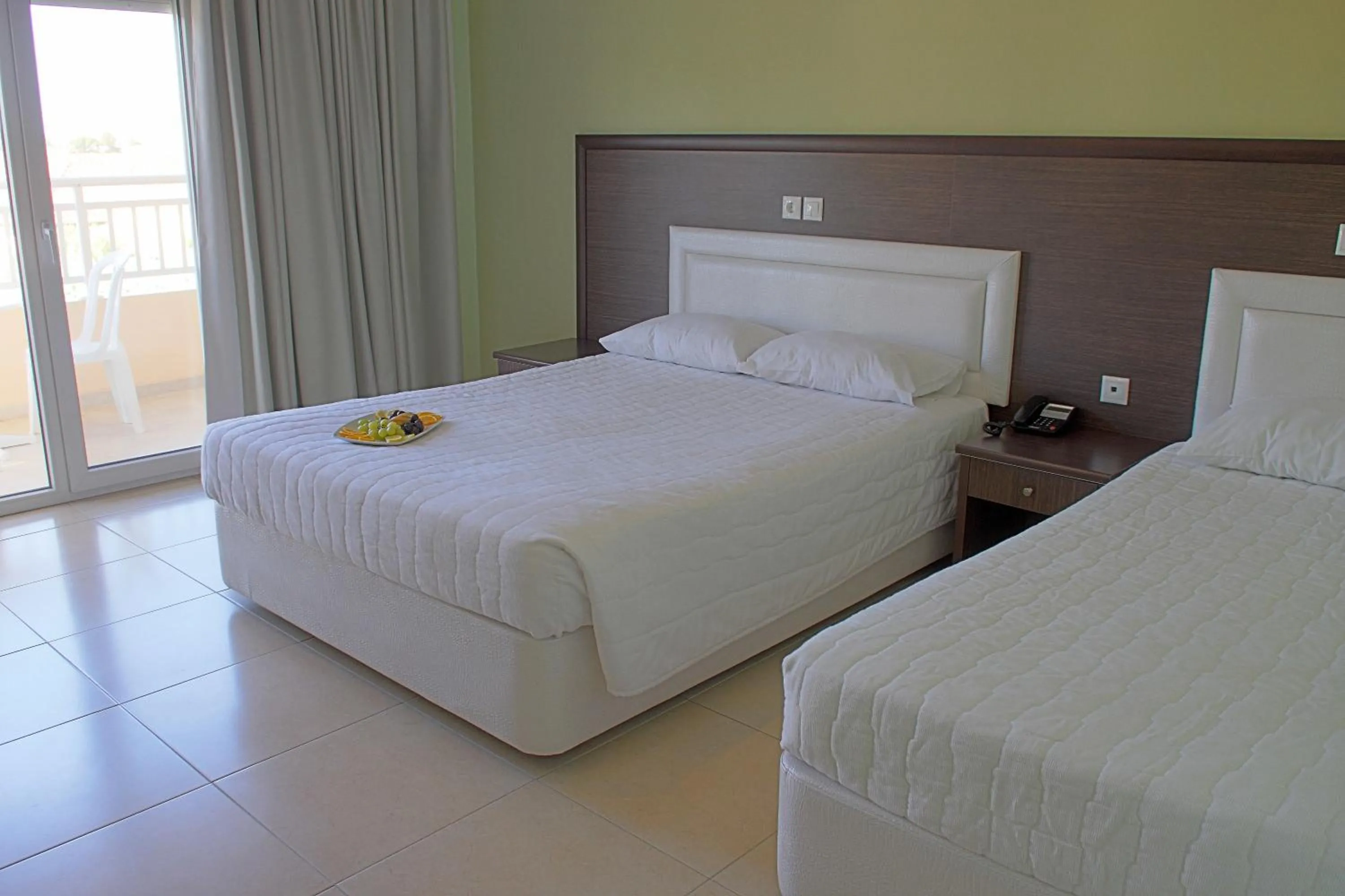 Bed in Grand Platon Hotel