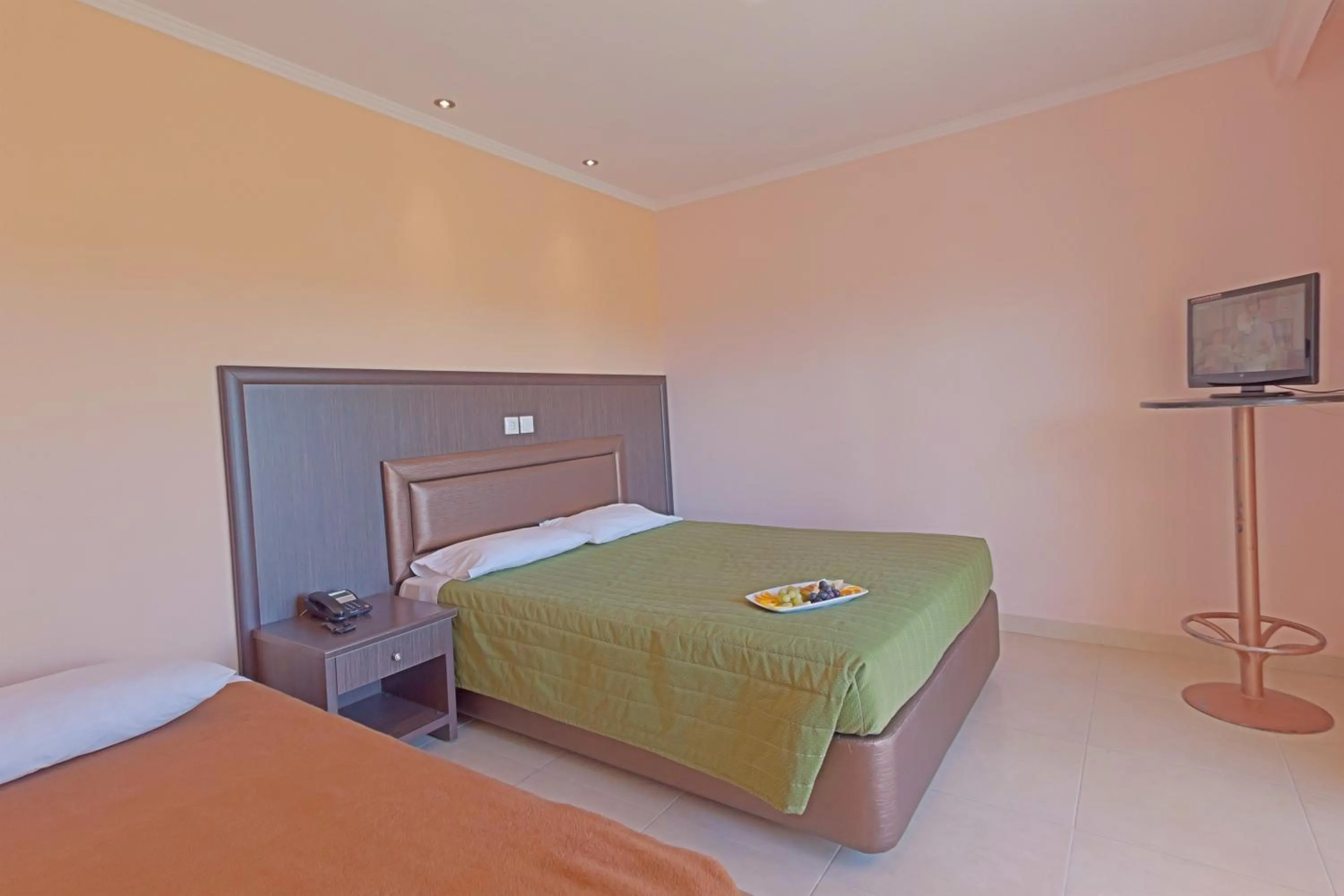 Bed in Grand Platon Hotel