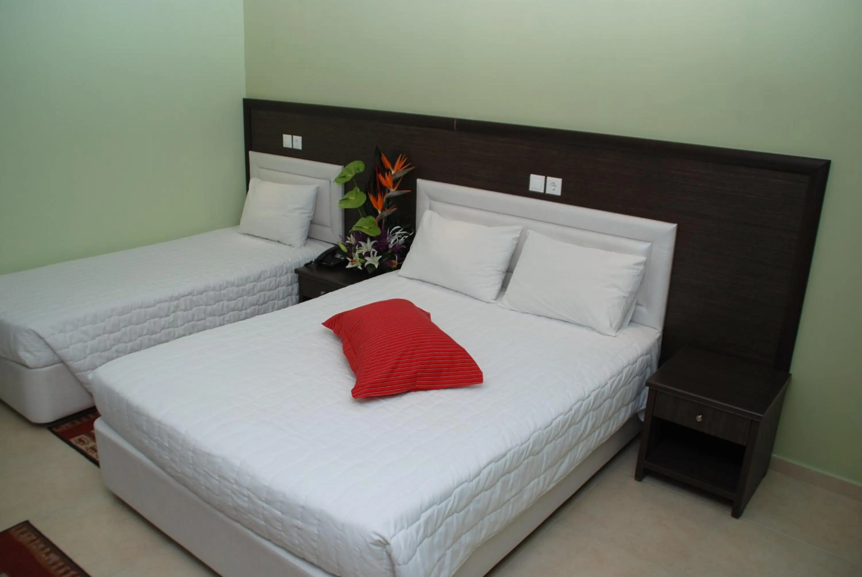 Bed in Grand Platon Hotel