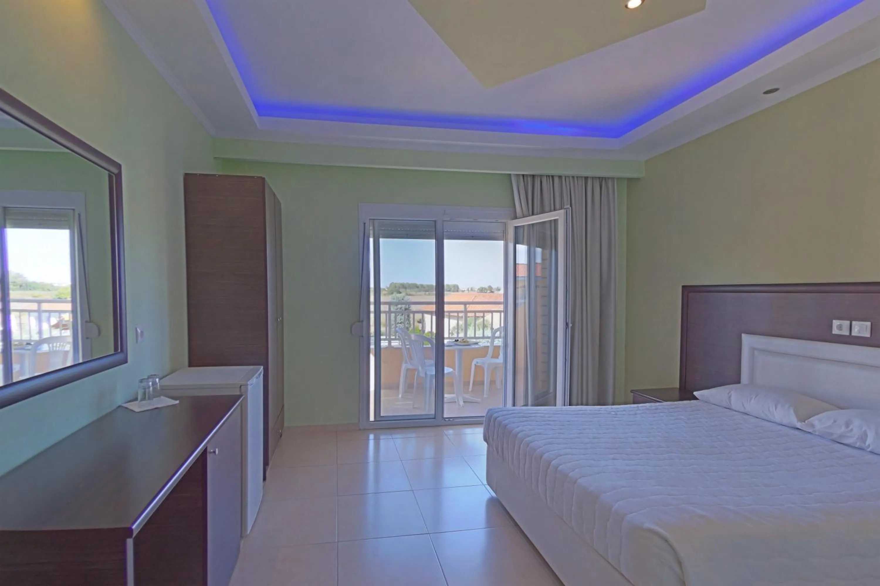 Bed in Grand Platon Hotel