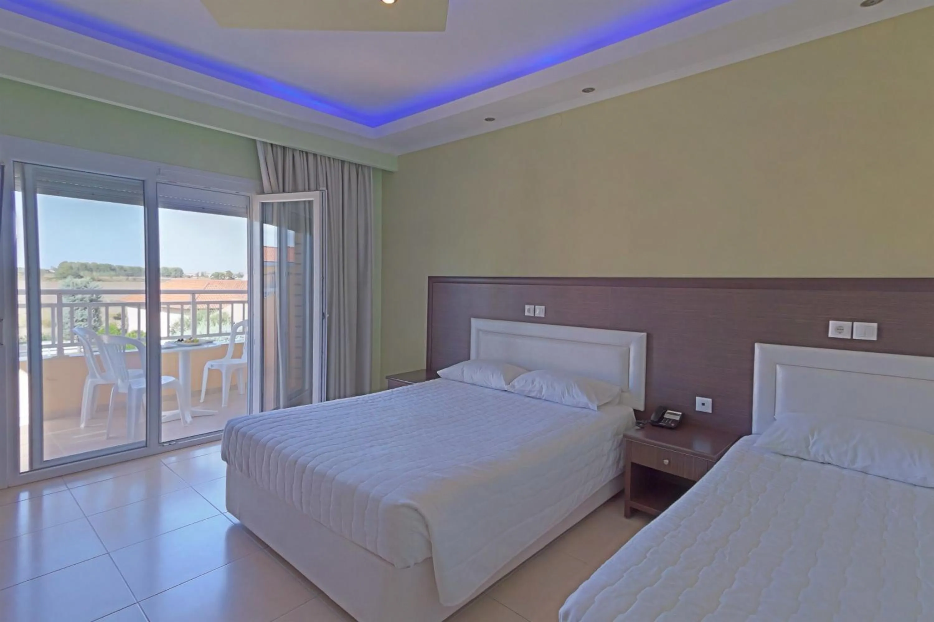 Bed in Grand Platon Hotel