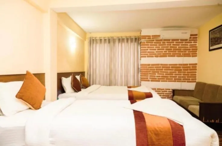 Bed in Doors Hotel Thamel
