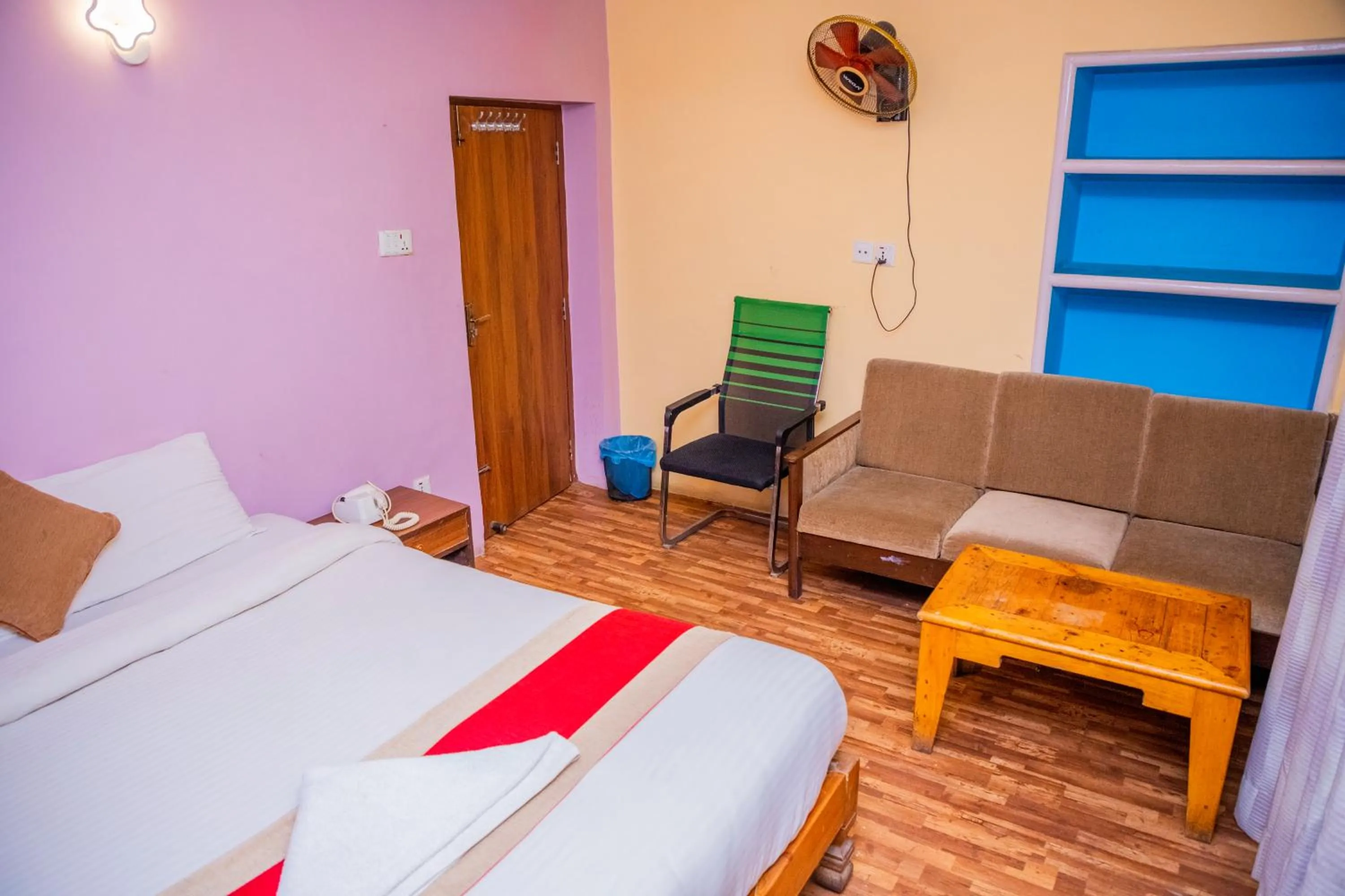 Seating area, Bed in Doors Hotel Thamel