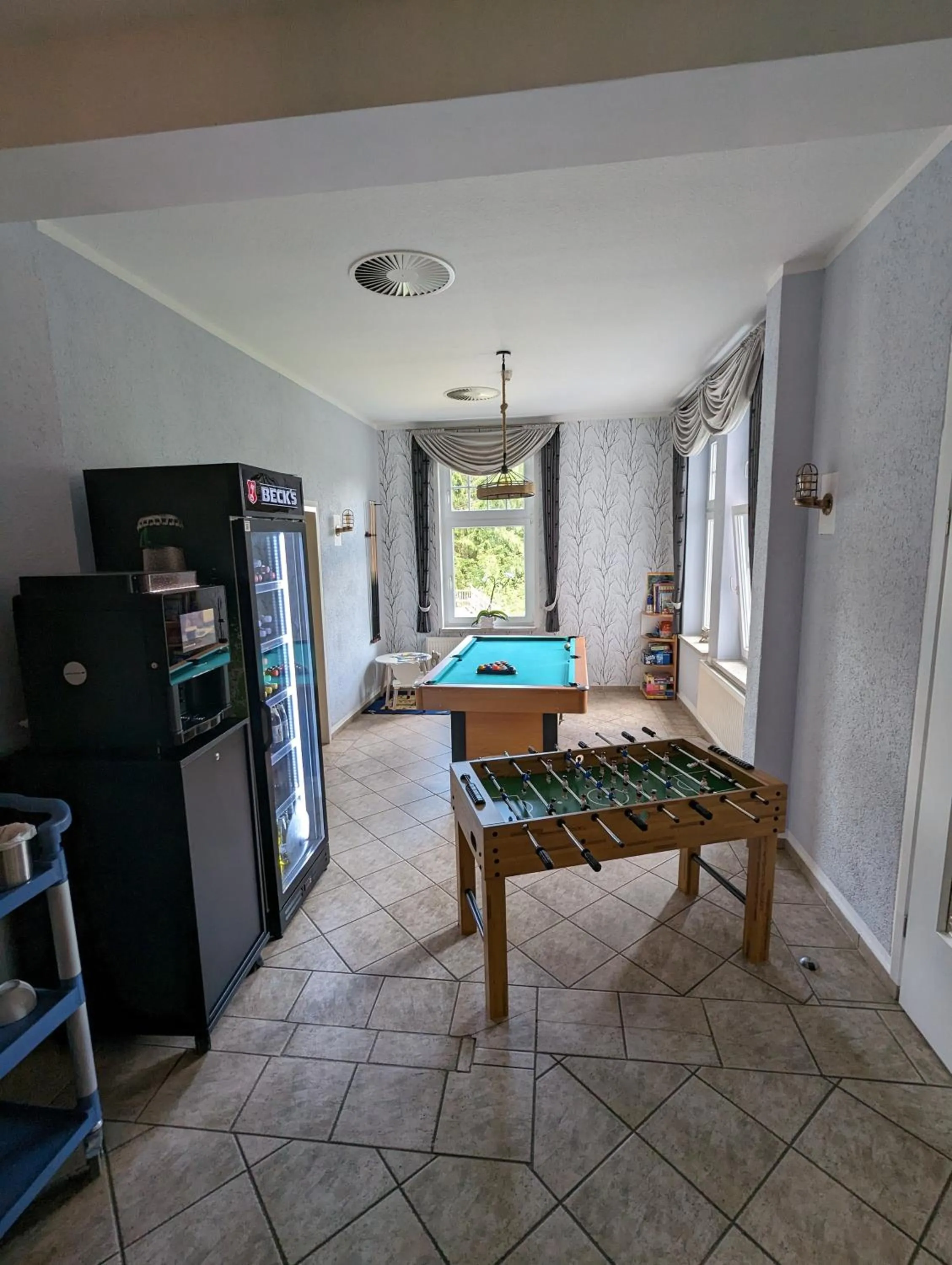 Communal lounge/ TV room in Waldgasthaus & Berghotel Steinerne Renne