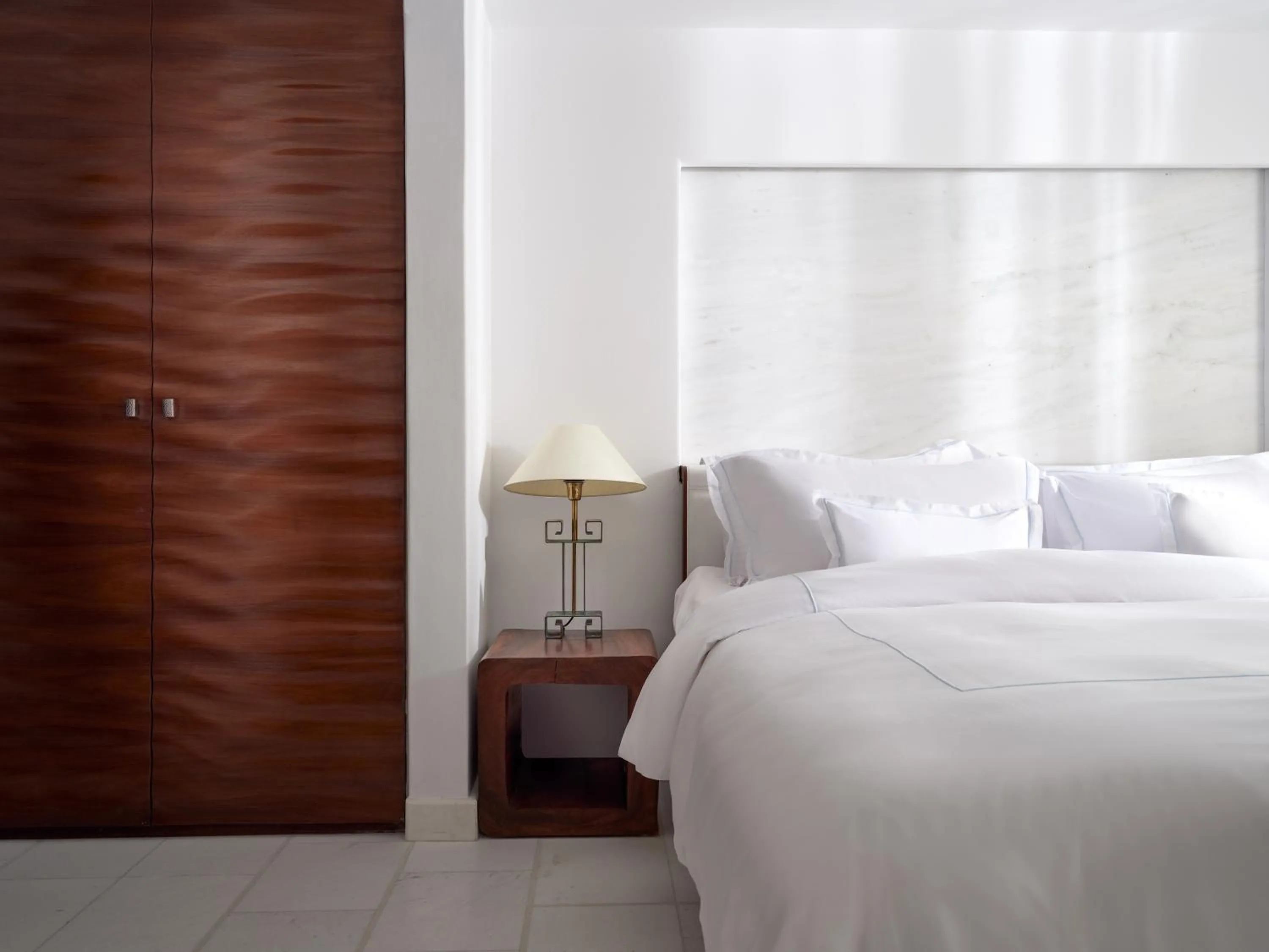 Bed in Belvedere Mykonos - Main Hotel - The Leading Hotels of the World