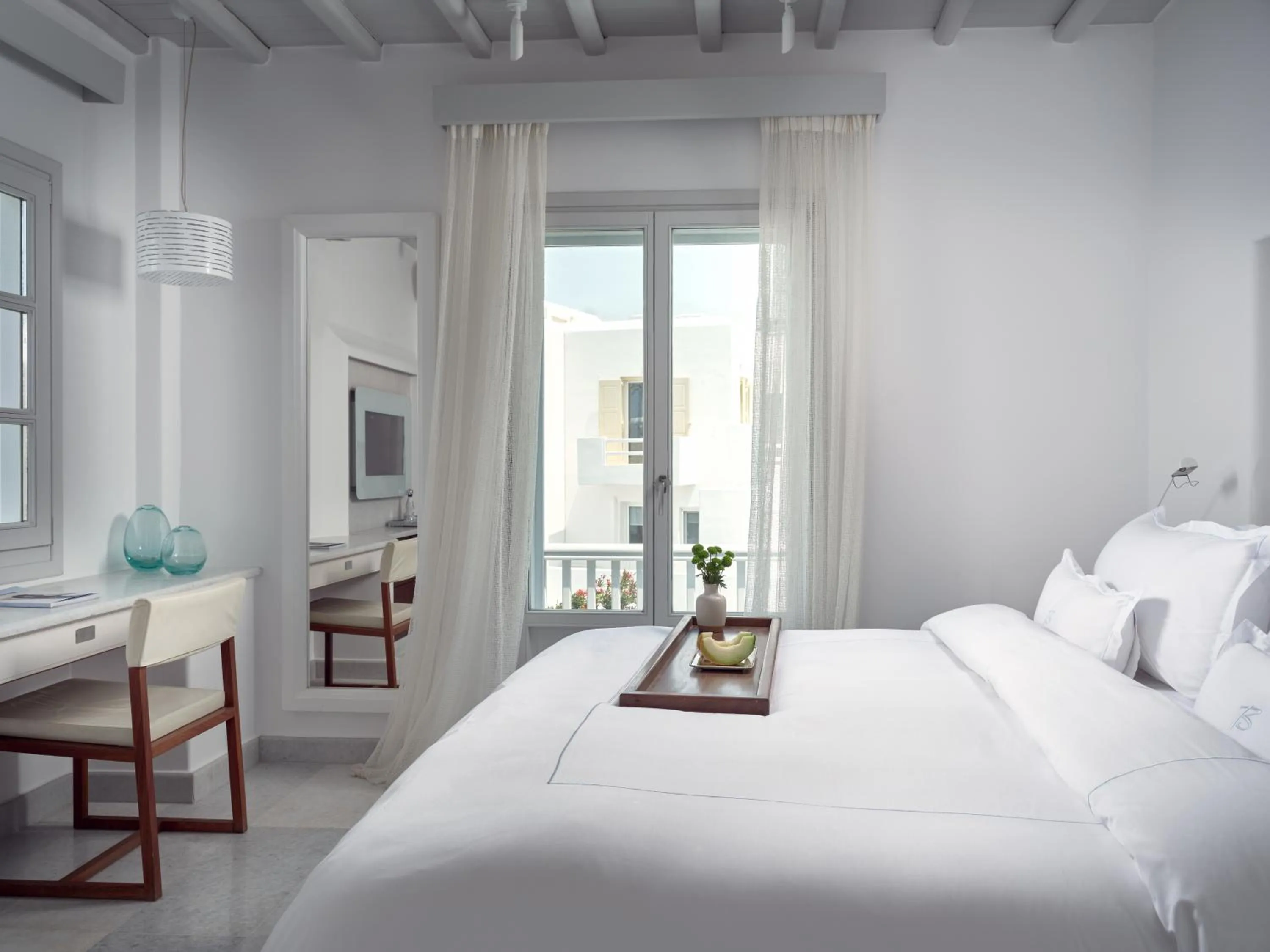 Bed in Belvedere Mykonos - Main Hotel - The Leading Hotels of the World