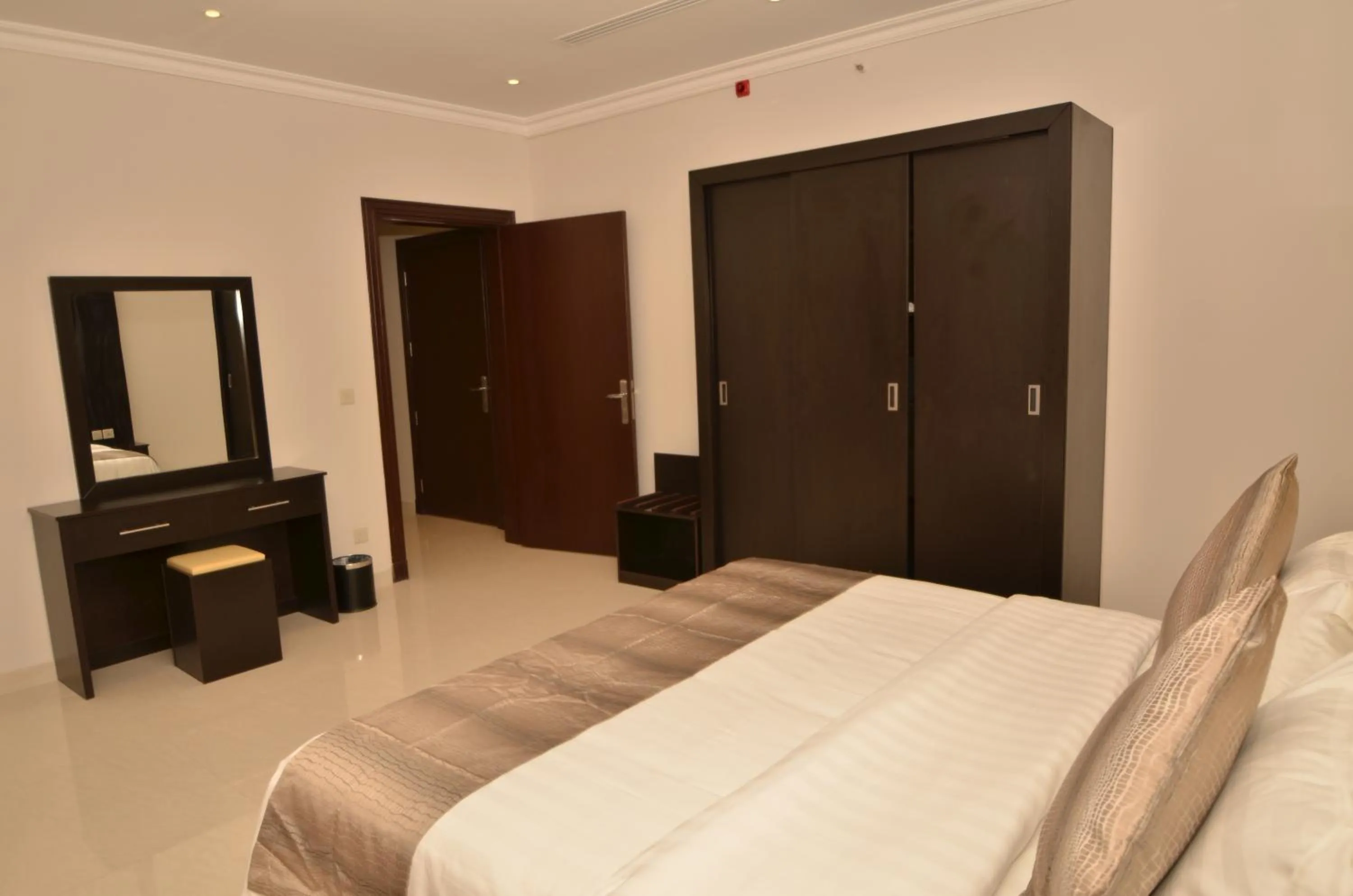 Living room, Bed in Nasima Serviced Apartments - Economy