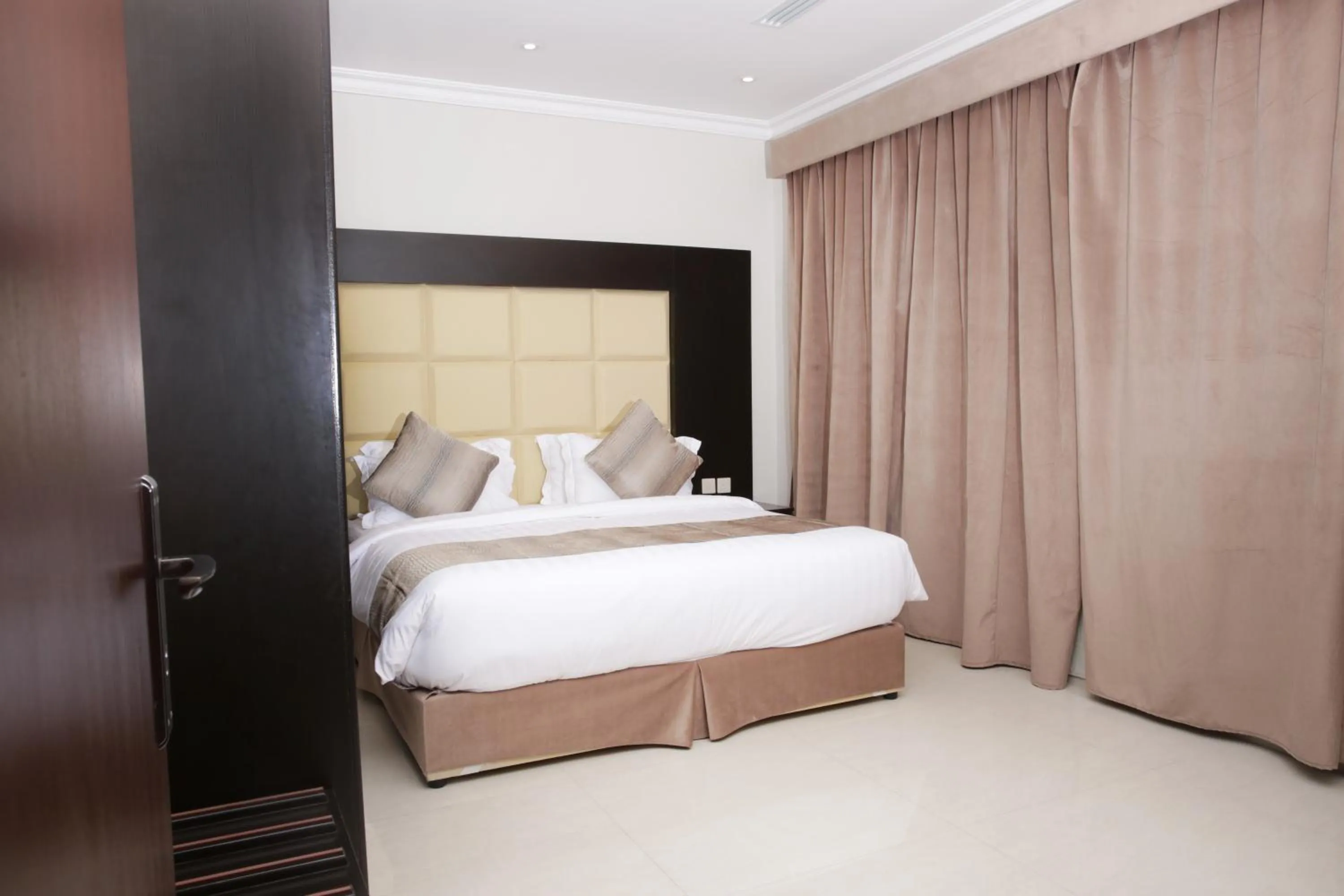 Photo of the whole room, Bed in Nasima Serviced Apartments - Economy