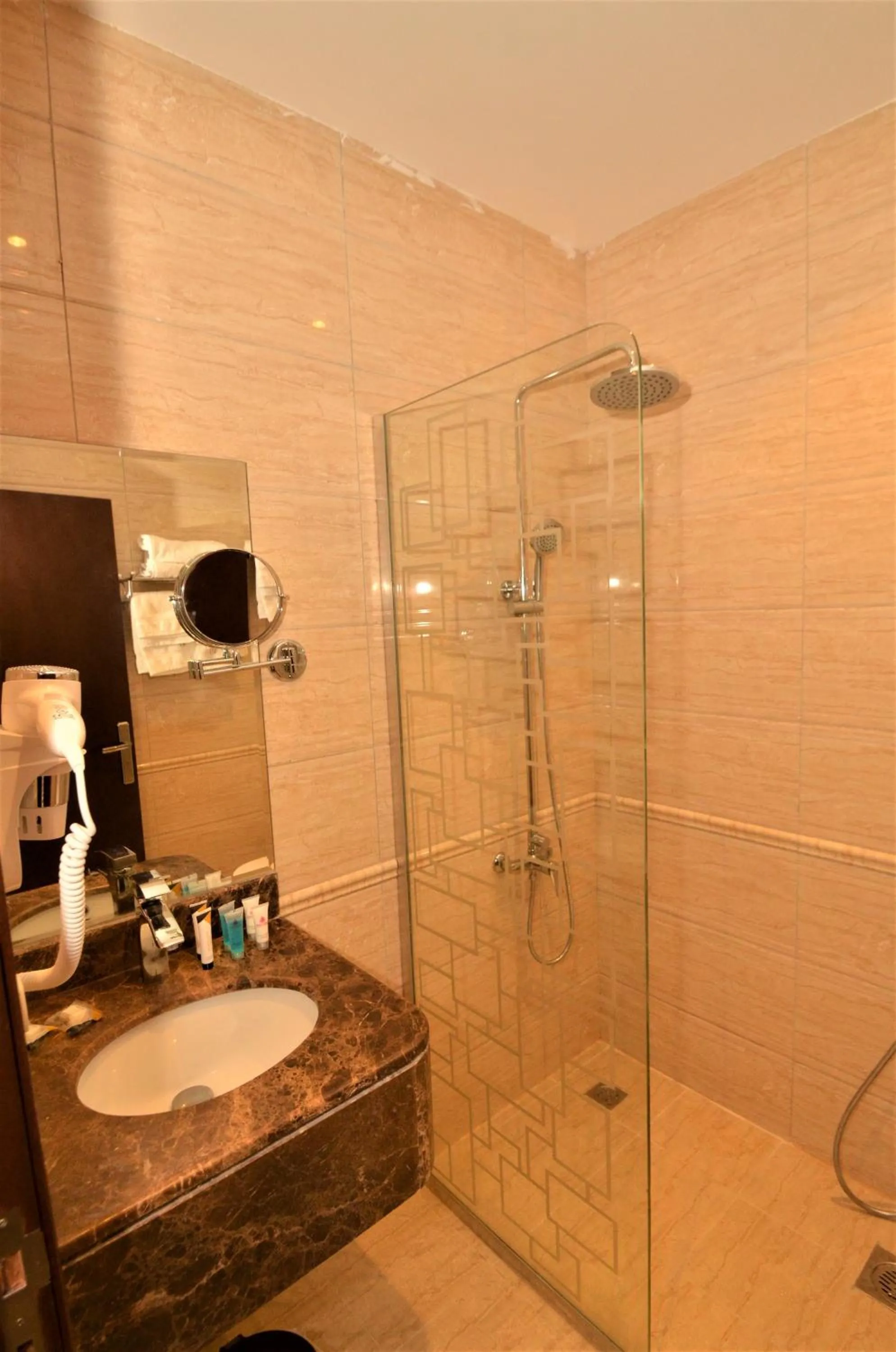 Shower in Nasima Serviced Apartments - Economy