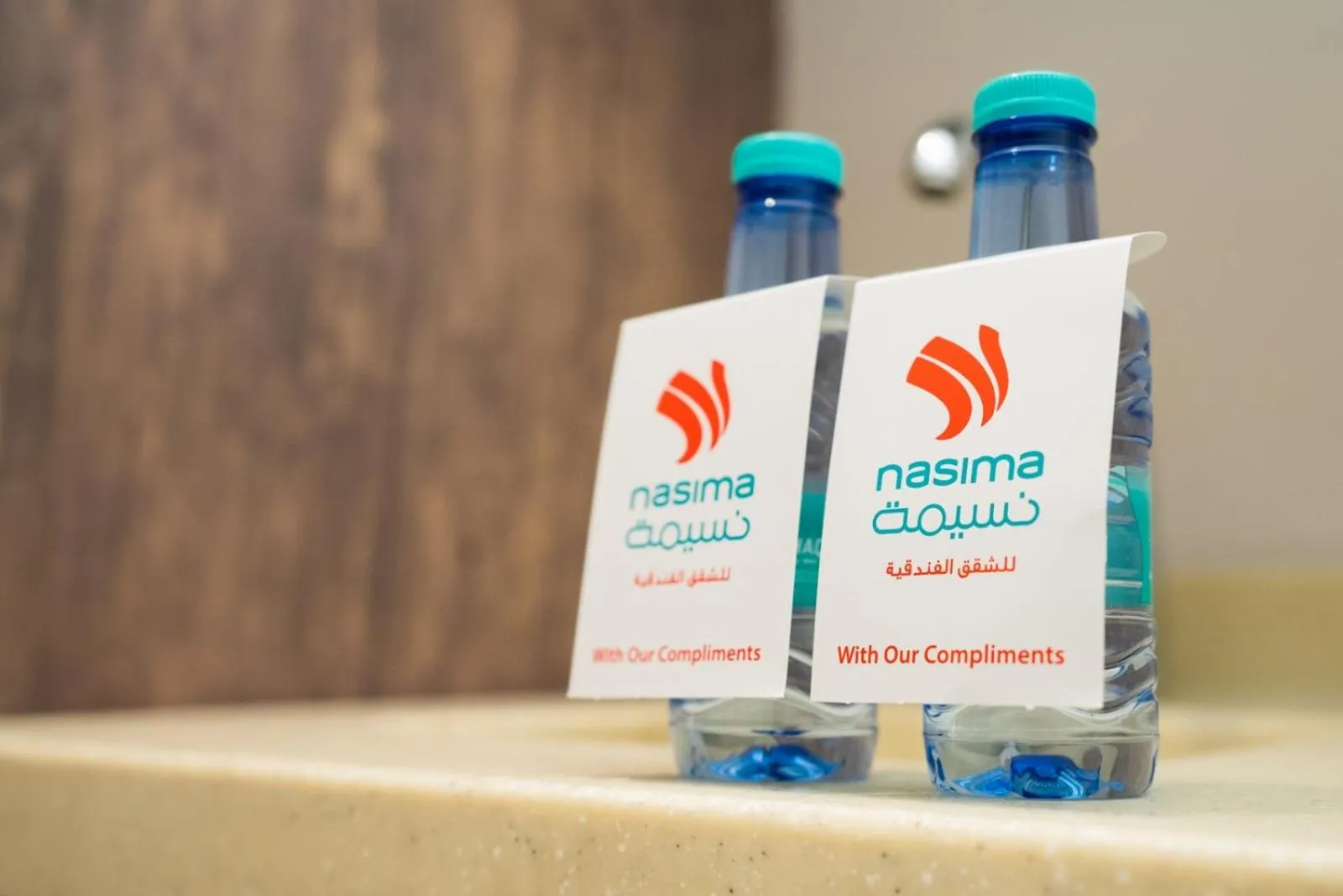 Property logo or sign in Nasima Serviced Apartments - Economy