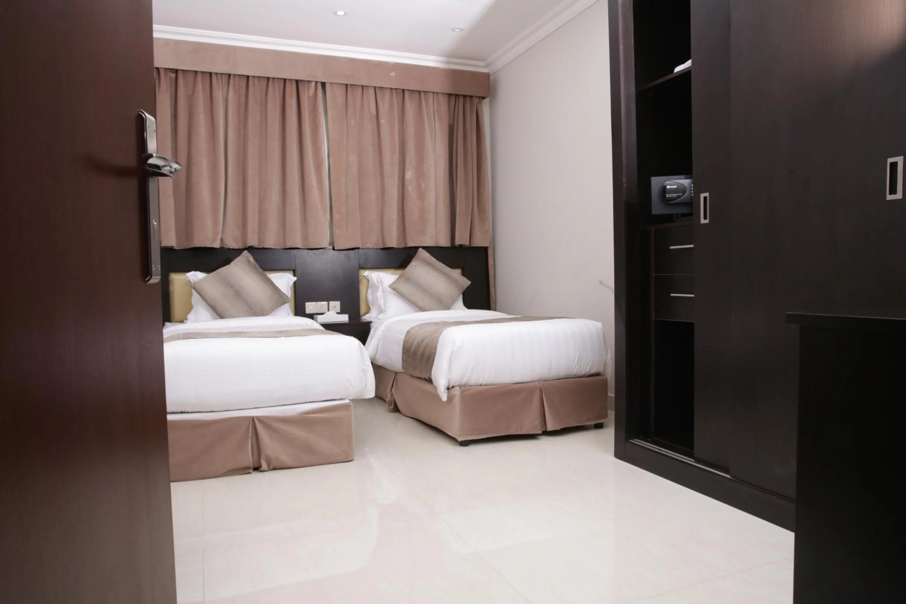 Bedroom, Bed in Nasima Serviced Apartments - Economy