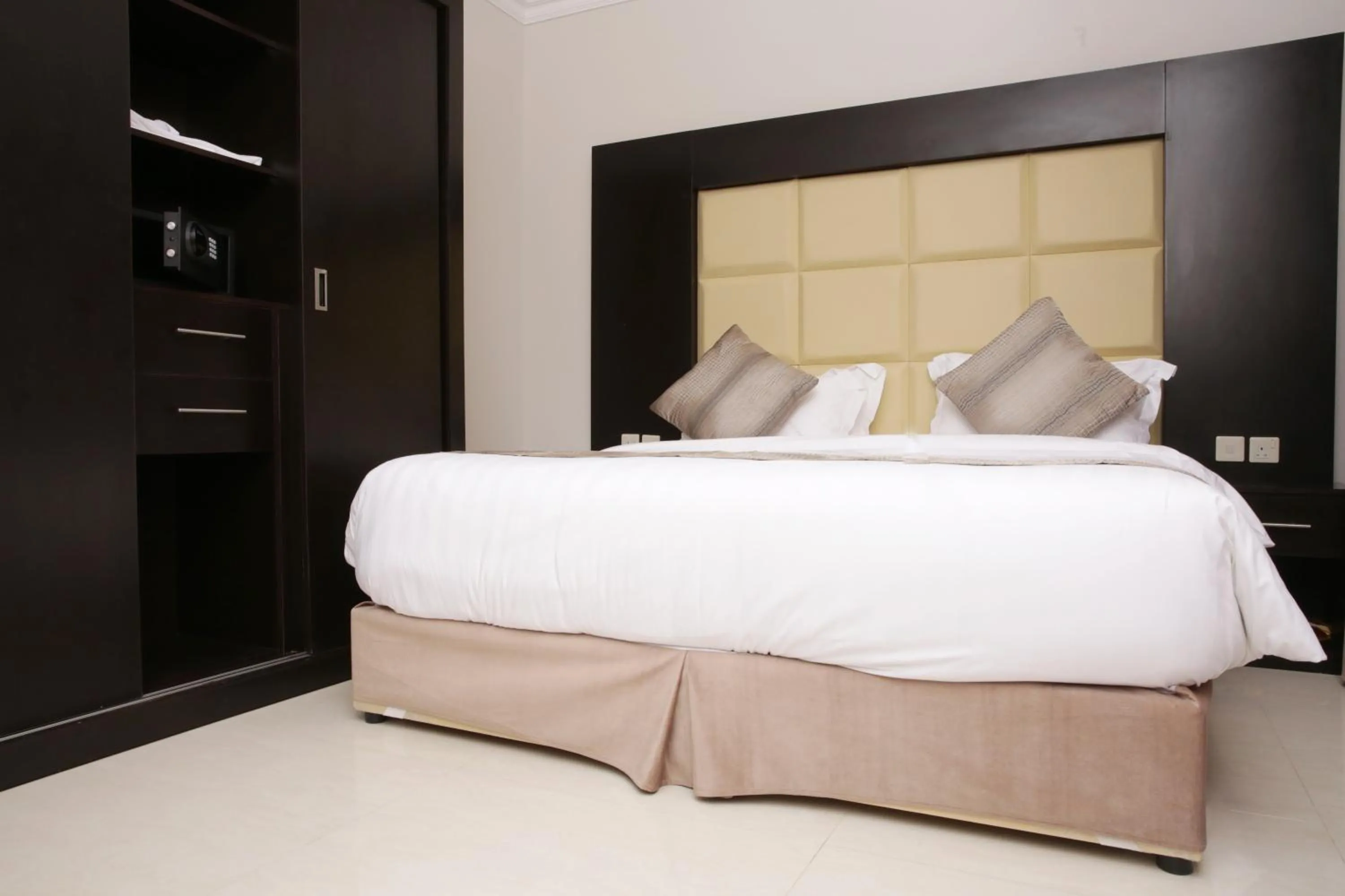 Decorative detail, Bed in Nasima Serviced Apartments - Economy