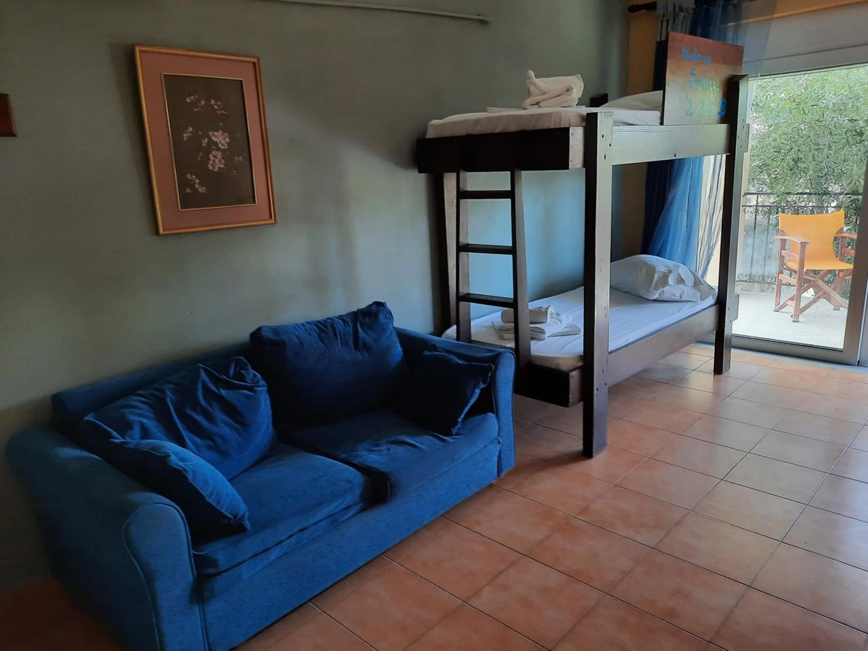 Seating area, Bed in O Xenonas Ton Mylon