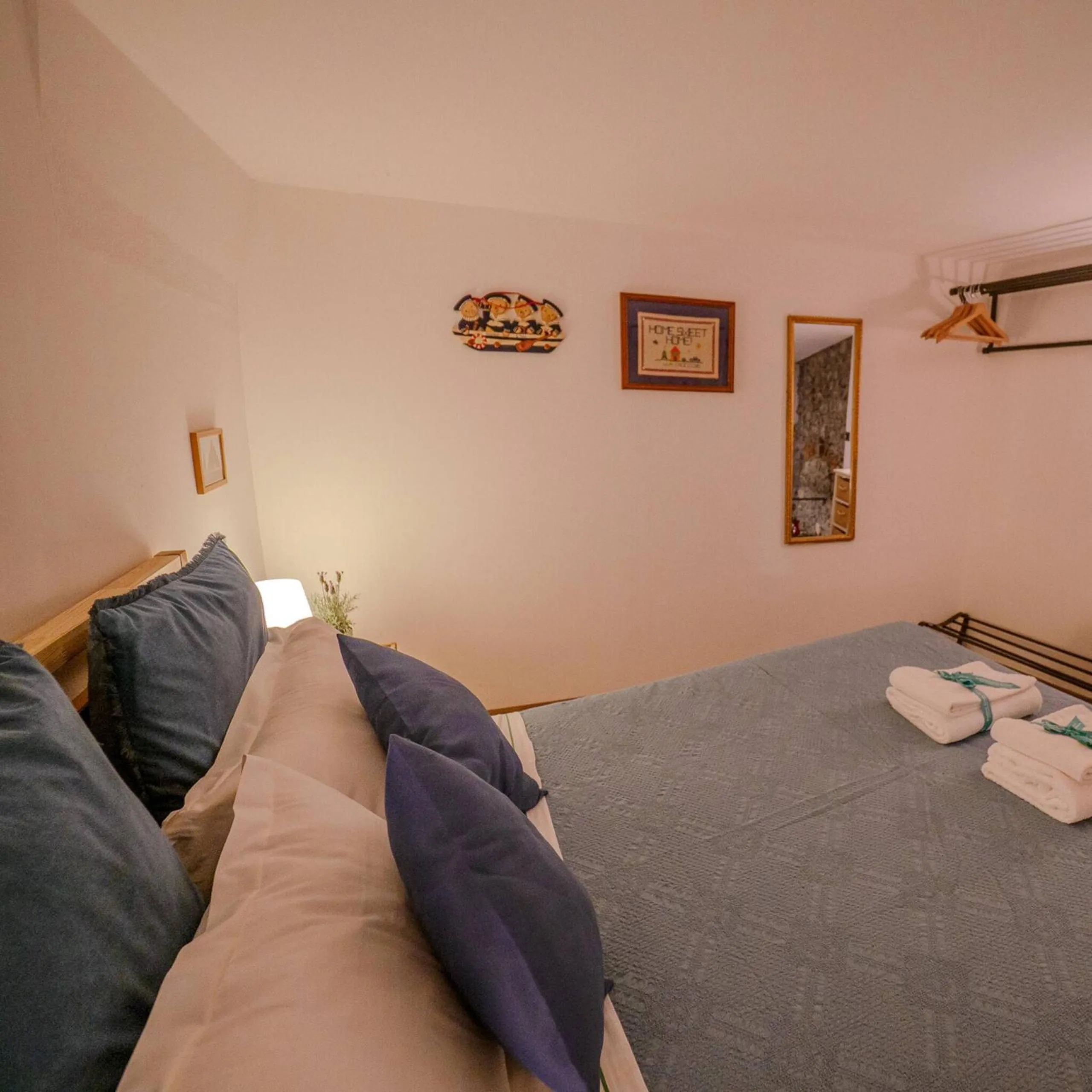 Bed in Petrella's Point Studio with AC